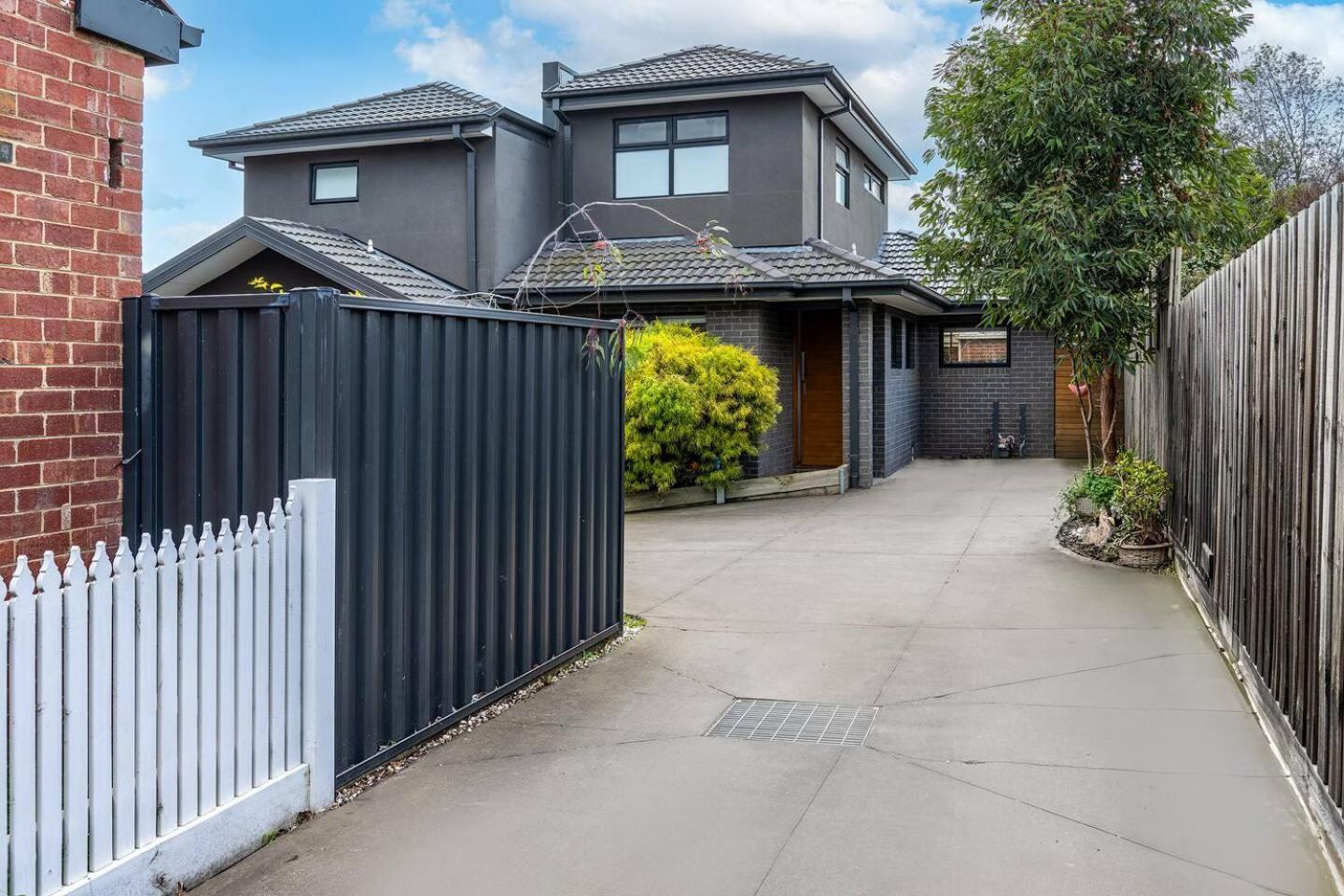 Chic modern home with private backyard and carpark