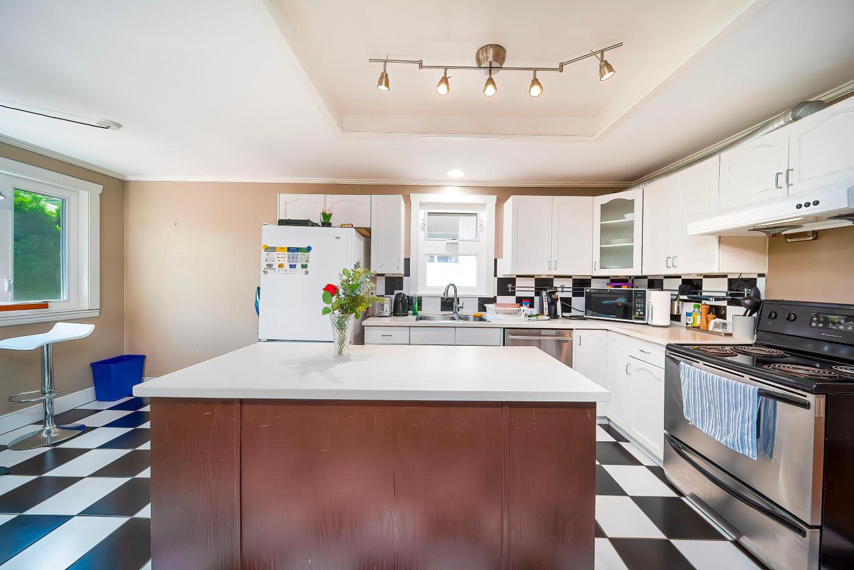 Charming Home Near UBC with Parking & Backyard