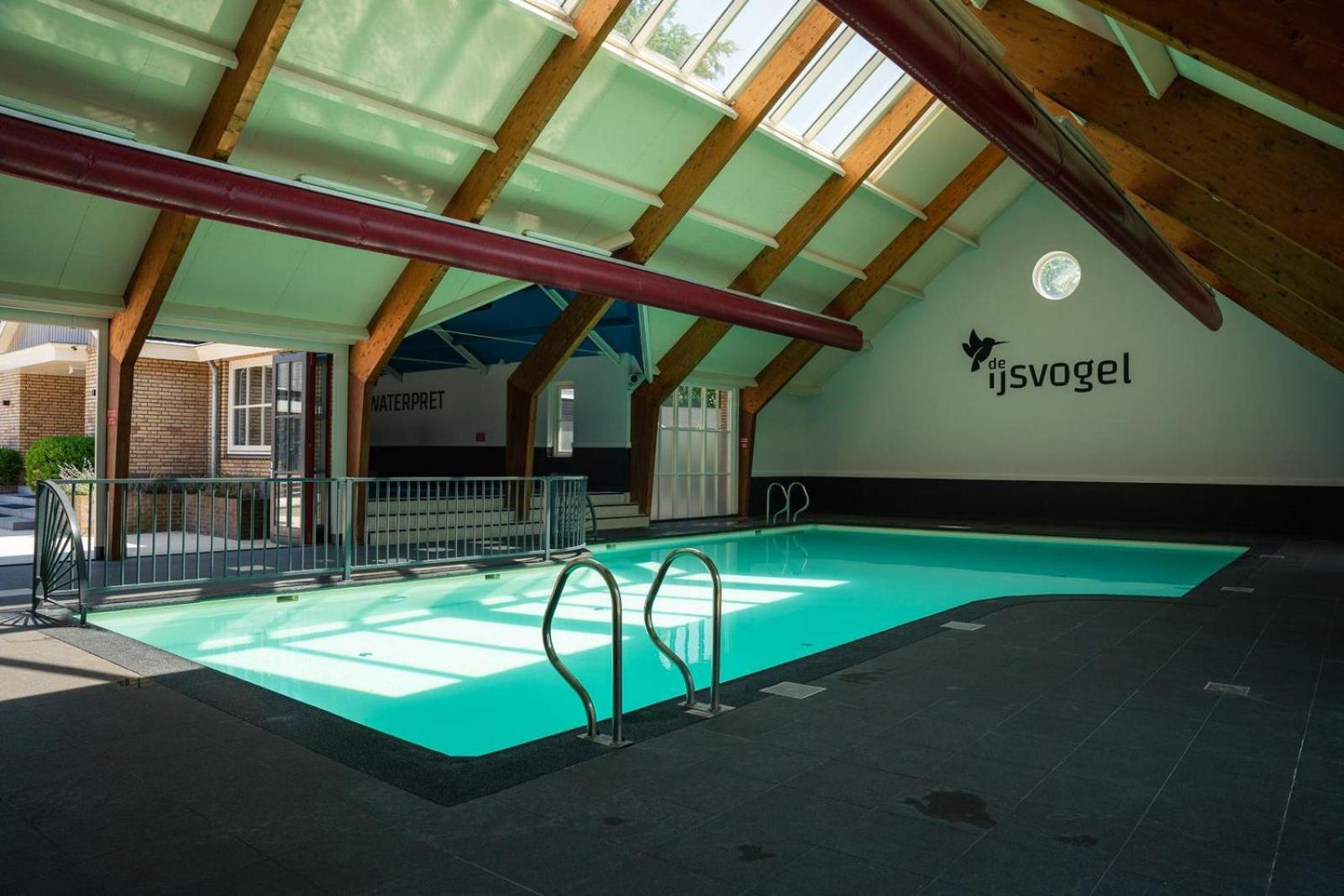 Holiday house with private SAUNA and HOTTUB on park de Ijsvogel with swimming pools and children entertaiment AIRCO