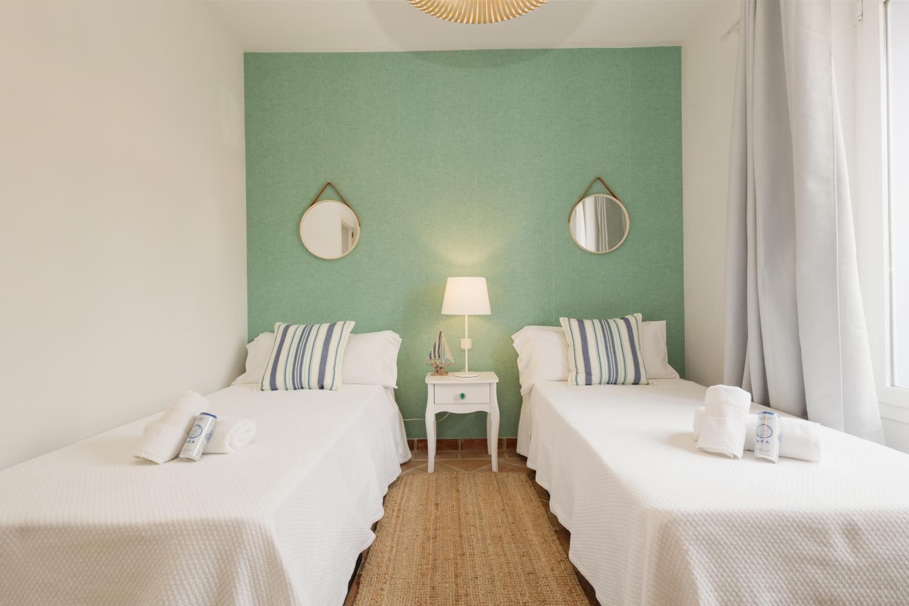Apartment, with private terrace and in beachfront urbanization with heated pool, in Casares Costa