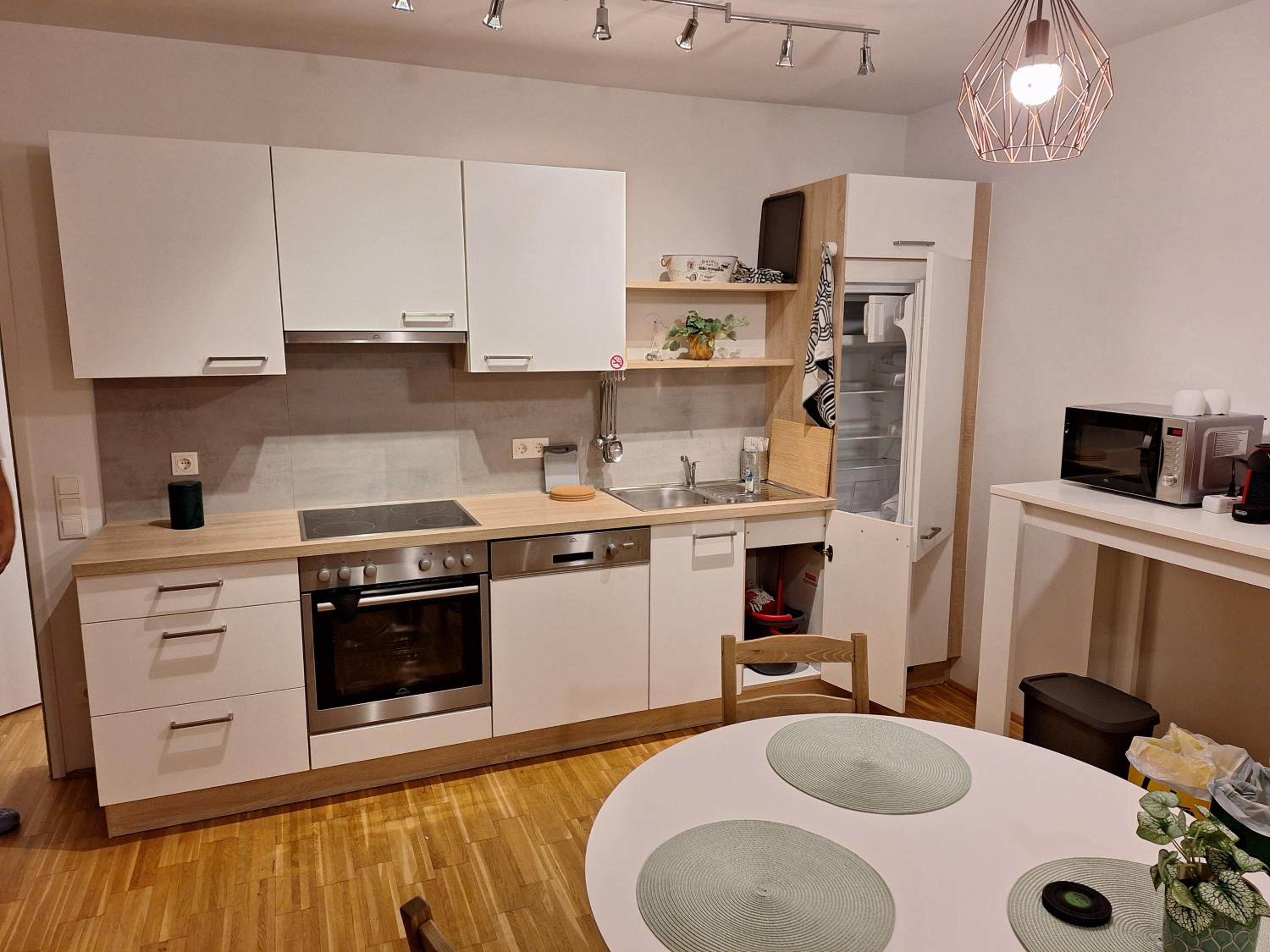 Modern yet cozy apartment with all amenities and quiet south-balcony