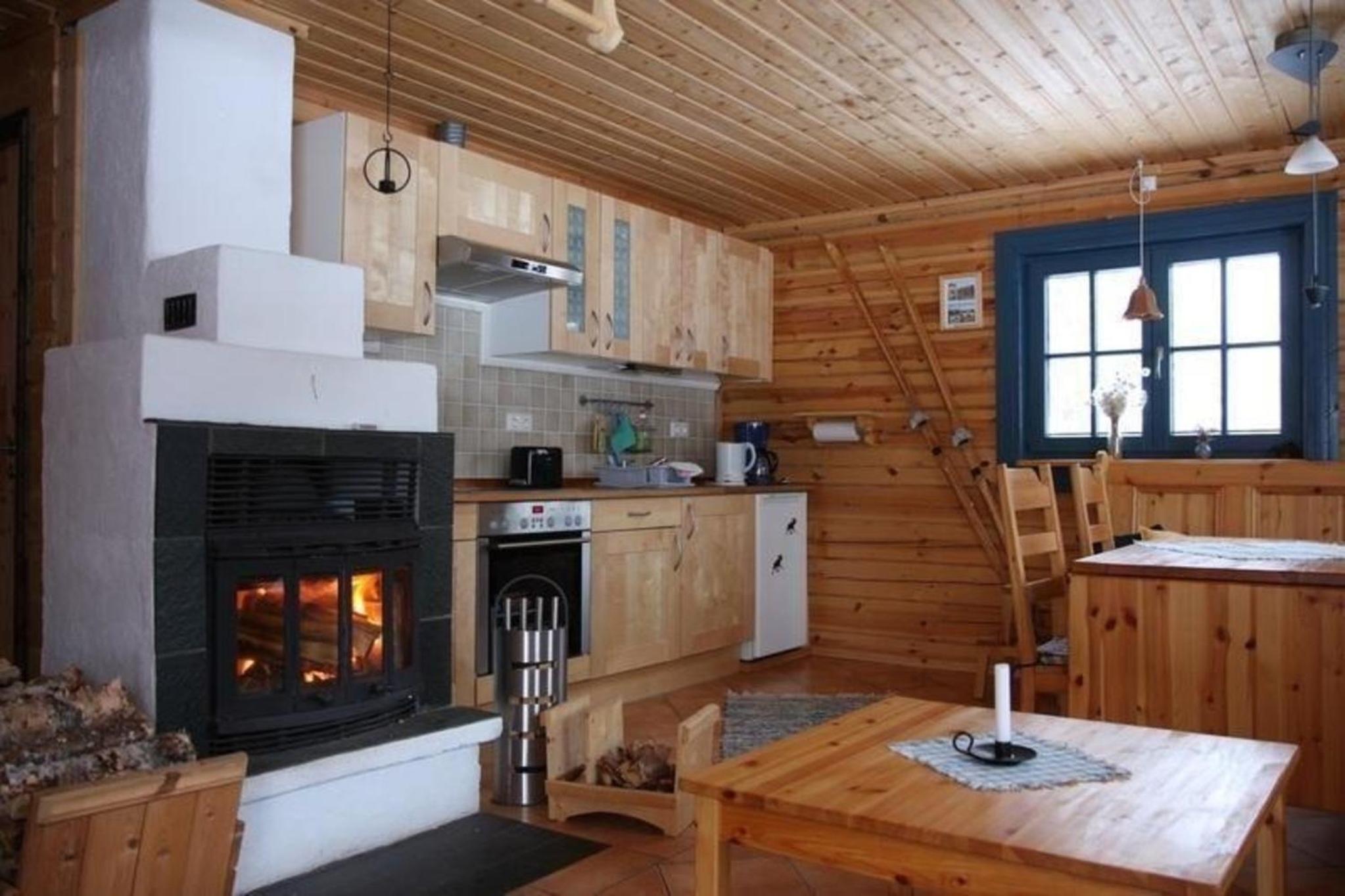 Gemütliches Blockhaus mit Kamin im Oviksfjäll