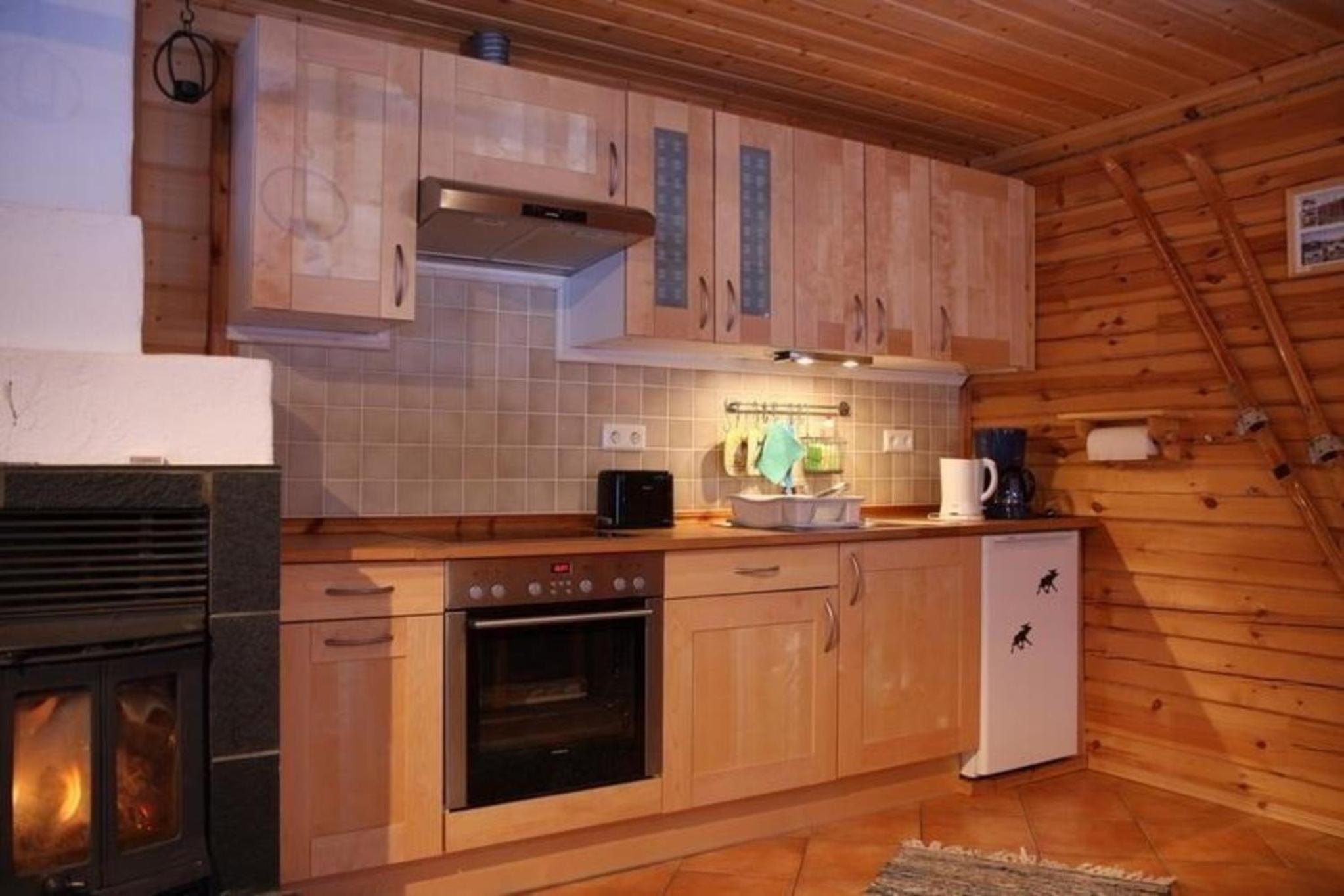 Gemütliches Blockhaus mit Kamin im Oviksfjäll