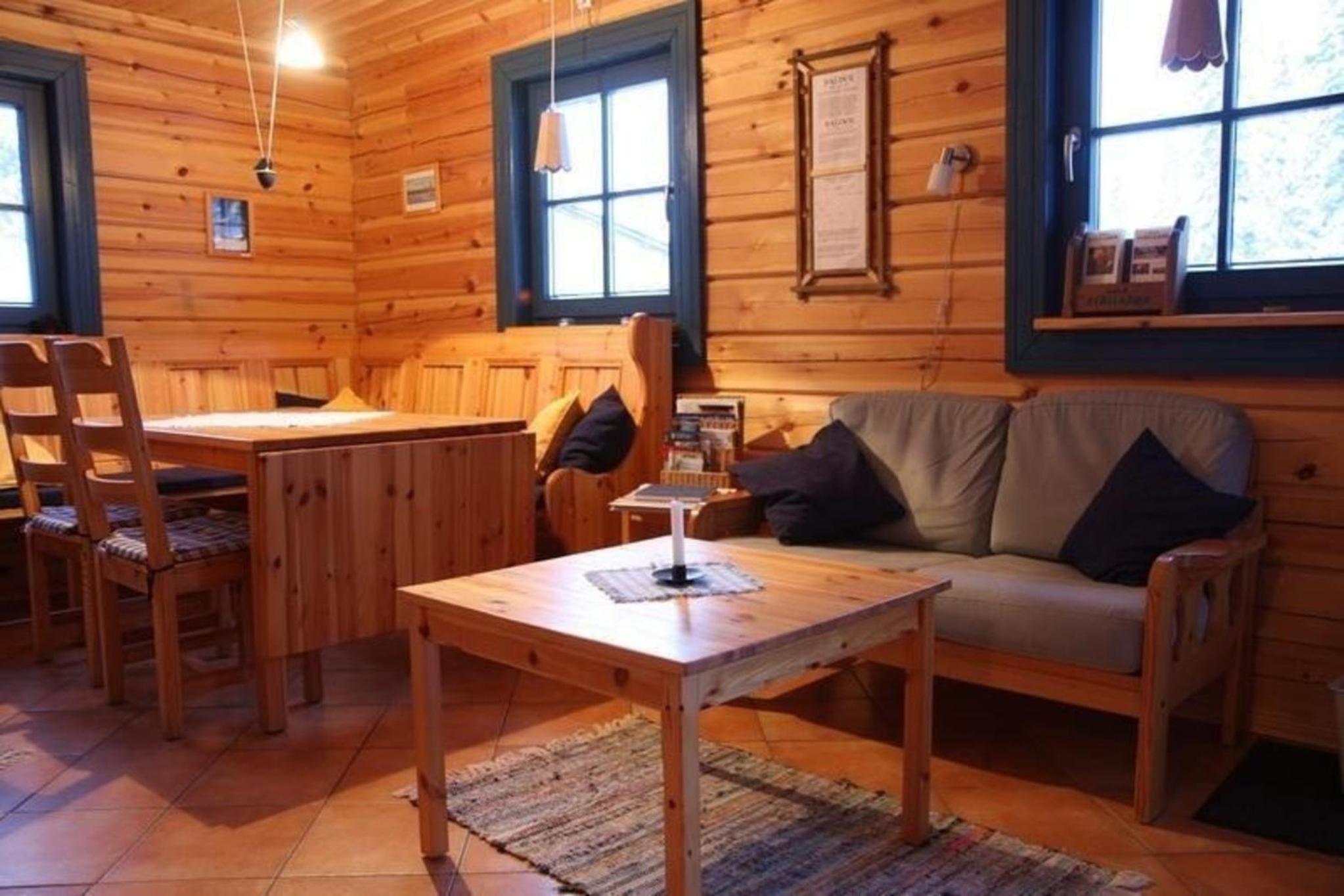 Gemütliches Blockhaus mit Kamin im Oviksfjäll