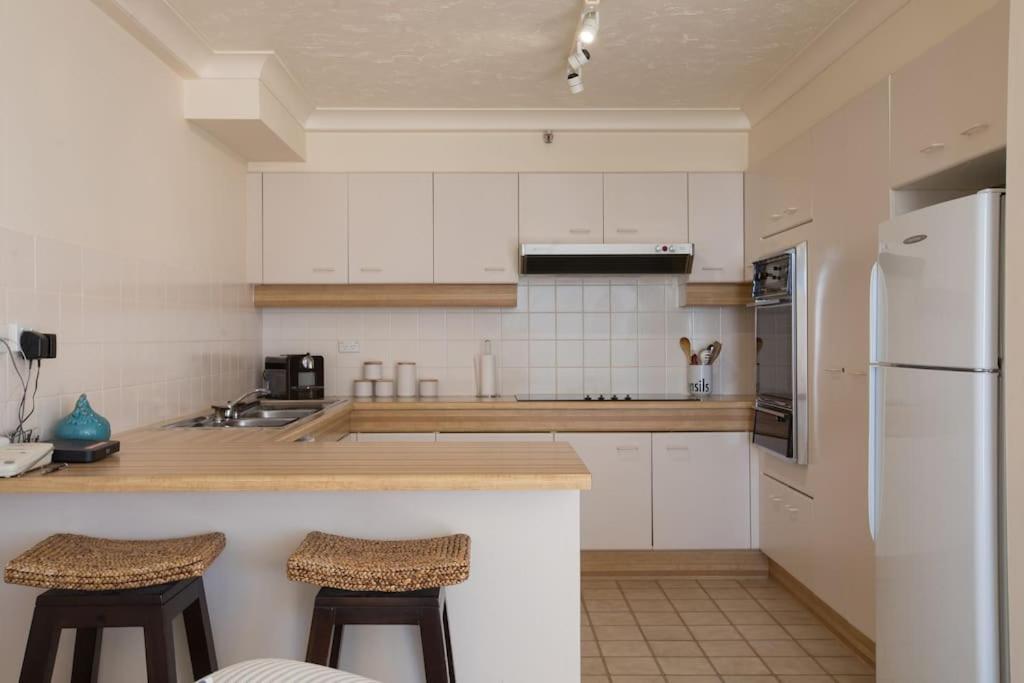 2BR Beachfront Family Friendly Surfers Apartment