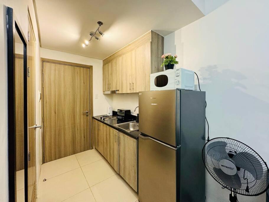 1BR Condotel with Balcony at FAME Residences #FM41 view 3