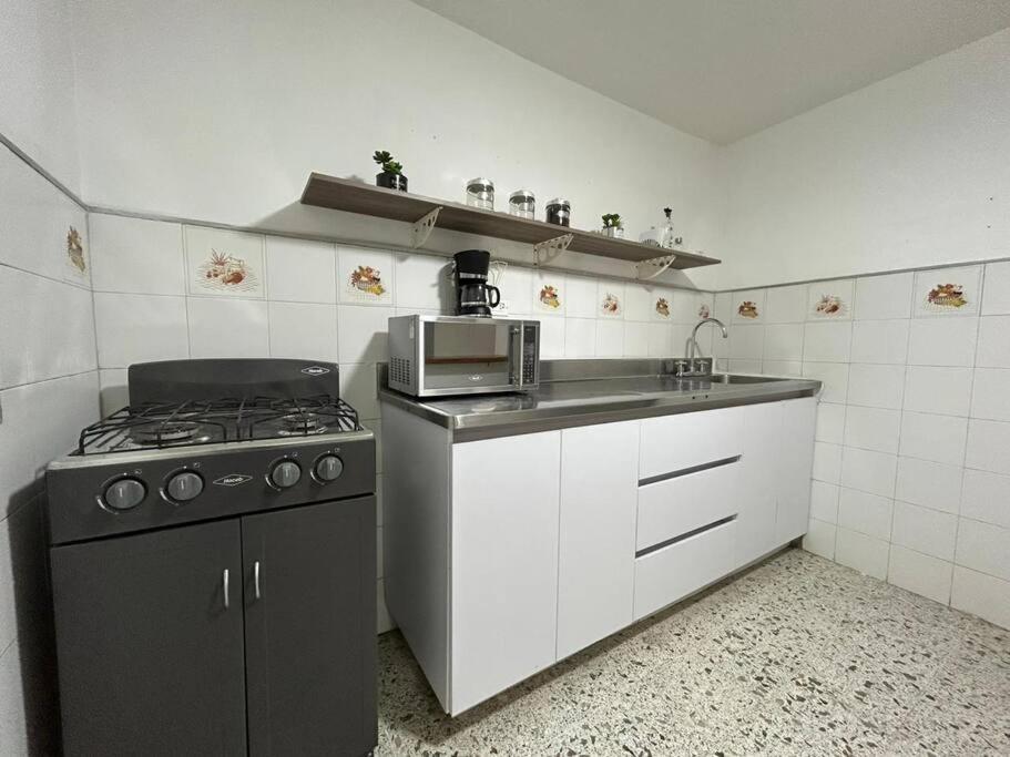Iluminado y hermoso apartamento con terraza