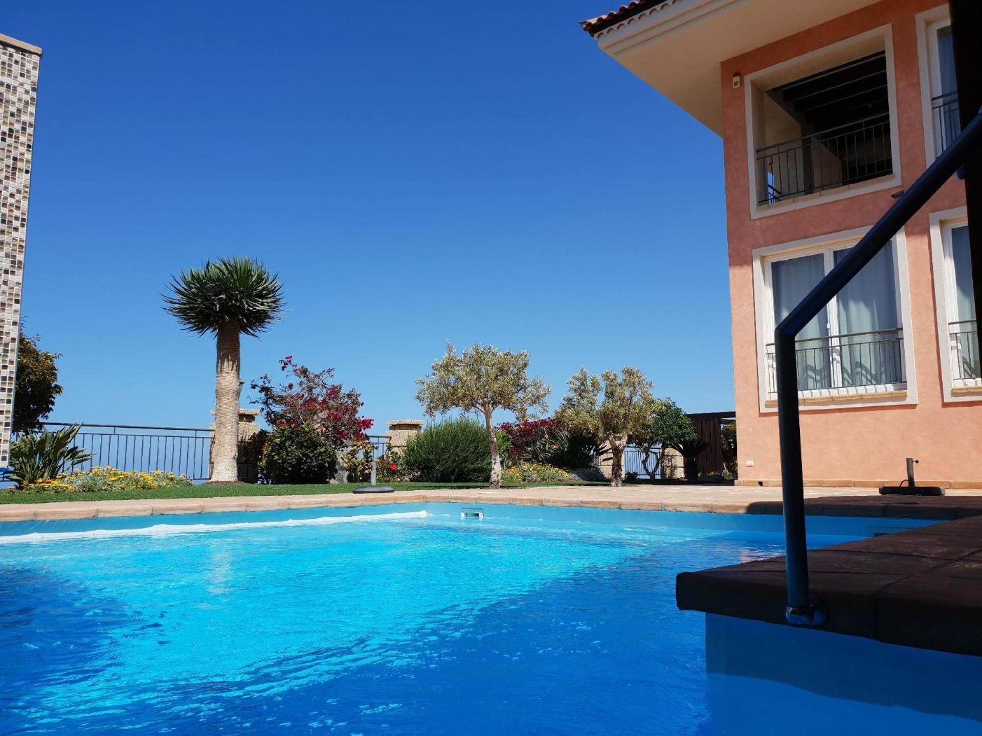 Villa Strelitzia mit Balkon und Meerblick