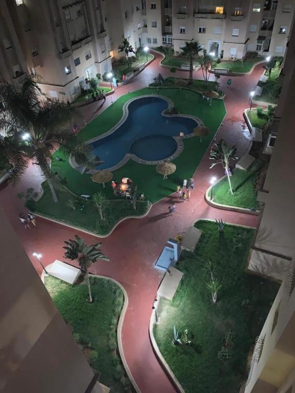 Appartement au rdc de la résidence Rosiers avec piscine à Monammedia view 3