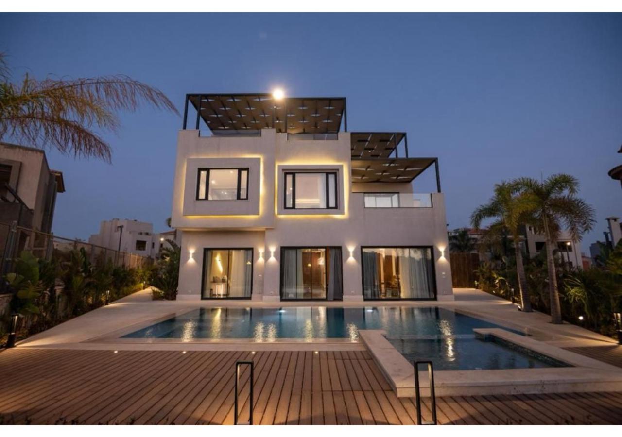 A wonderful stand alone villa with a fully furnished ultra modern swimming pool in Palm Hills in Sheikh Zayed