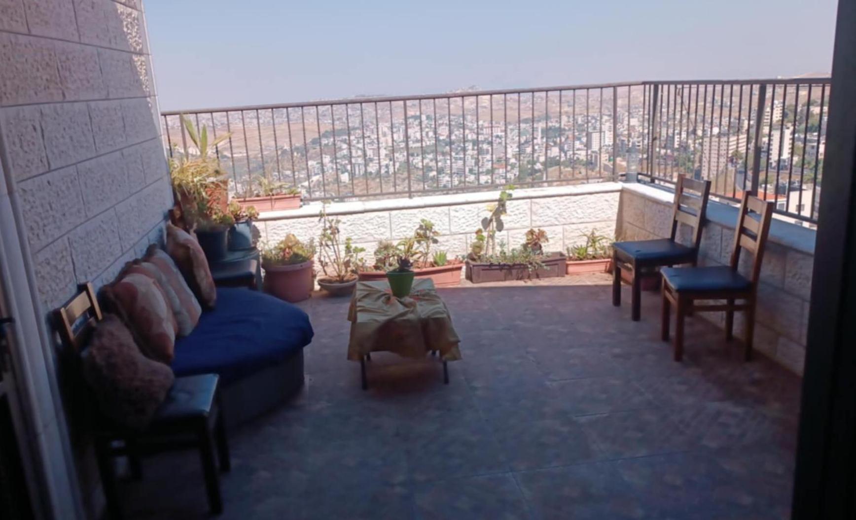 Elie' s rooftop studio view 2