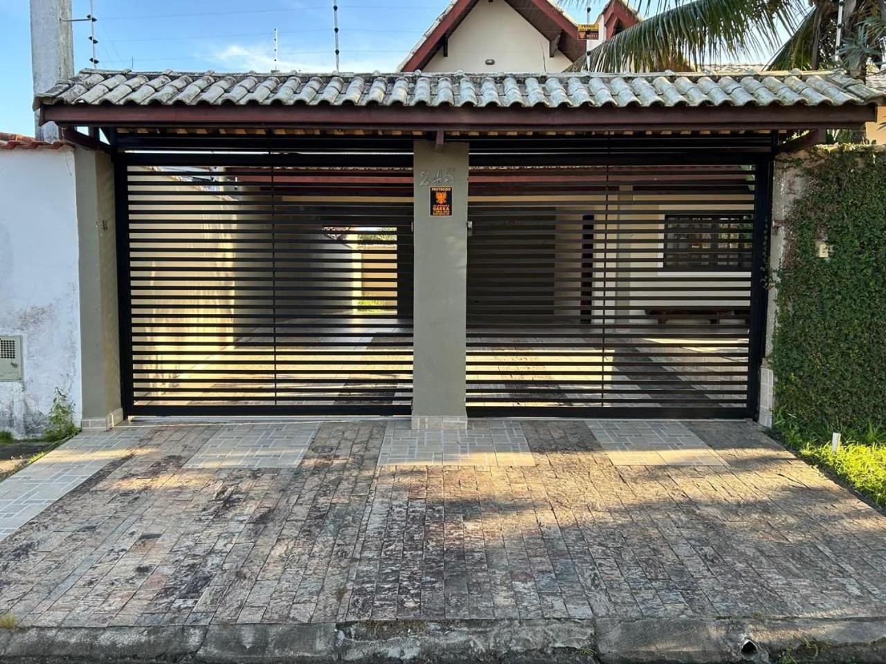P003 - Casa de 3 dormitórios com churrasqueira, apenas 150m da praia