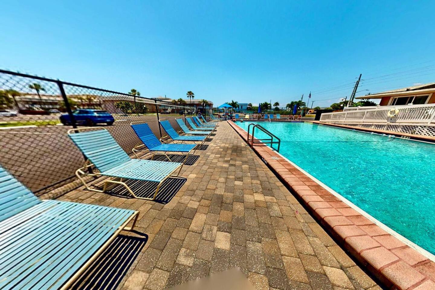 Just Cocoa Beachy - Cozy beachside condo with pool and beach access view 3