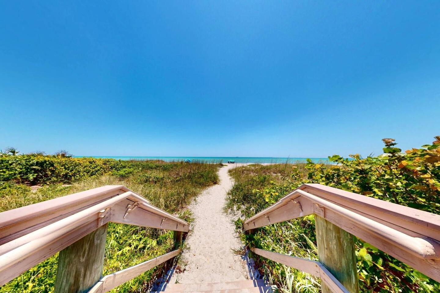 Just Cocoa Beachy - Cozy beachside condo with pool and beach access view 5