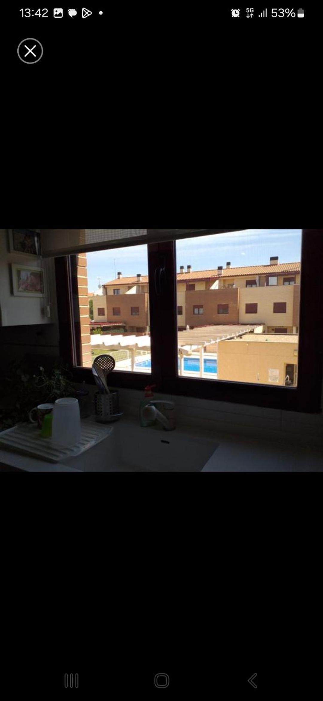 Duplex con piscina en barrio residencial