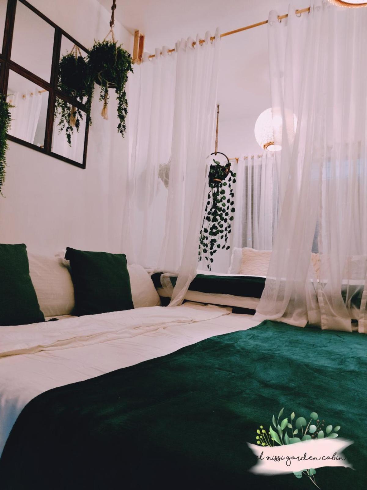 El Nissi Staycation, THE GARDEN CABIN, Enchanted Kingdom view 3