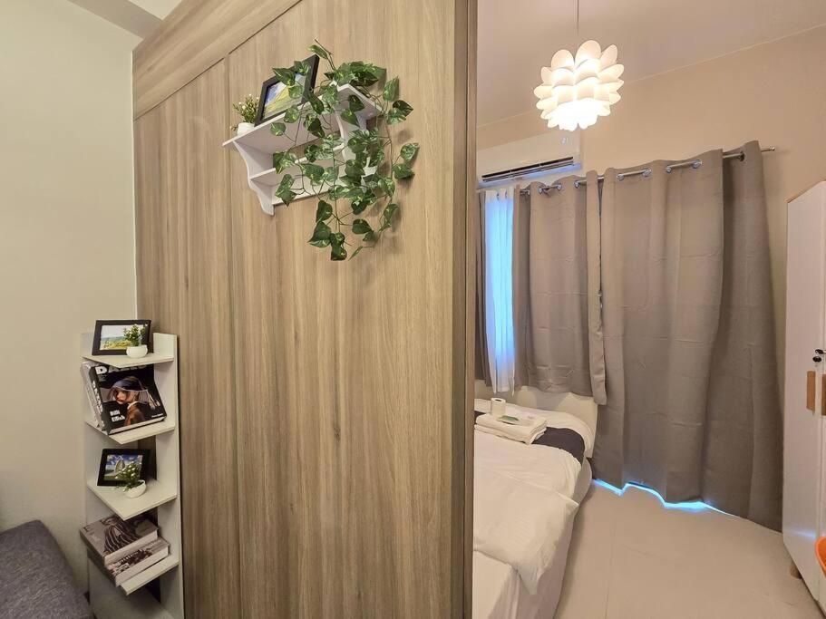1BR Condotel with Balcony at FAME Residences #FM44 view 3