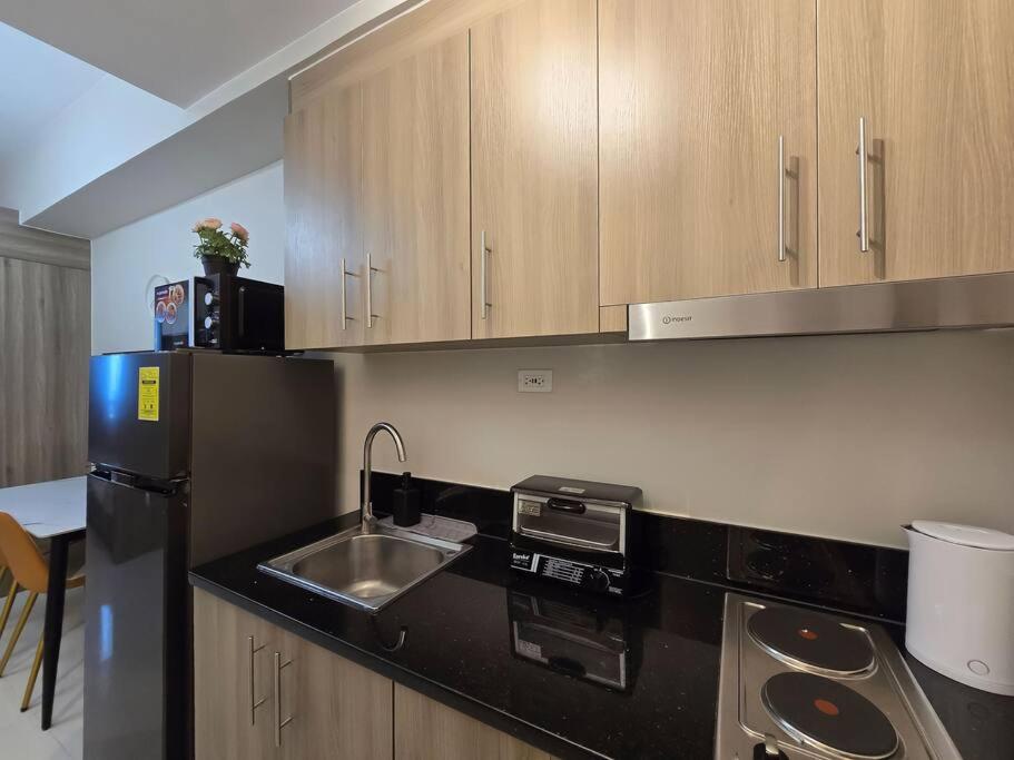 1BR Condotel with Balcony at FAME Residences #FM45 view 5