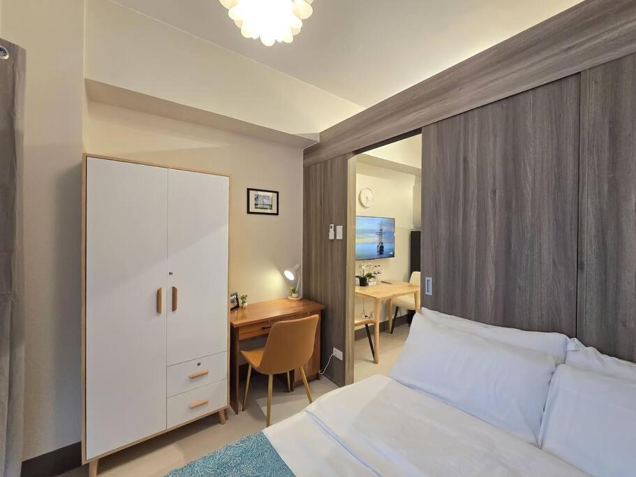 1BR Condotel with Balcony at FAME Residences #FM48