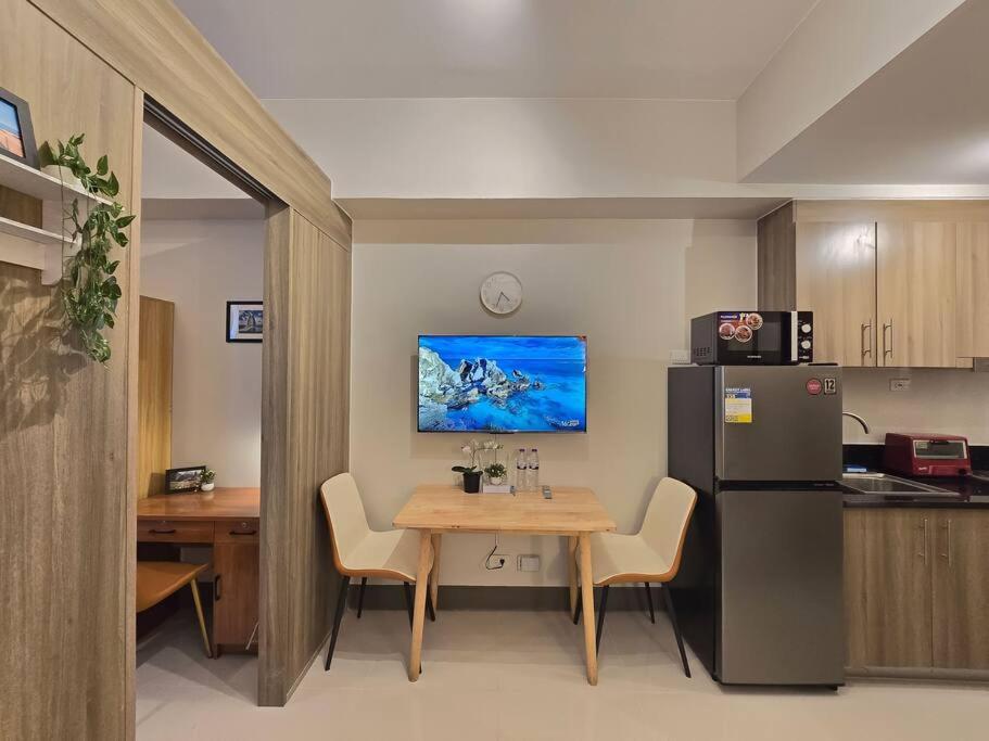 1BR Condotel with Balcony at FAME Residences #FM48