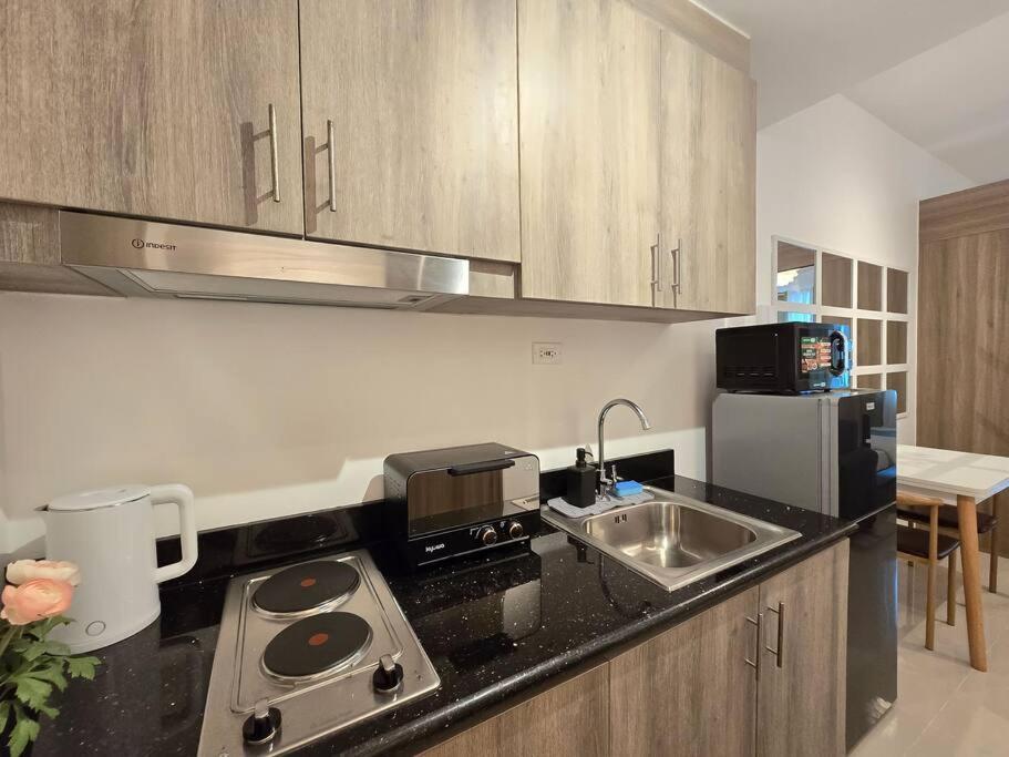 1BR Condotel with Balcony at FAME Residences #FM49 view 5