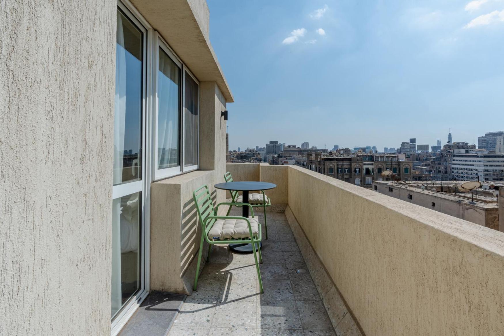 grey l studio apartments Downtown Cairo Ouzonian House