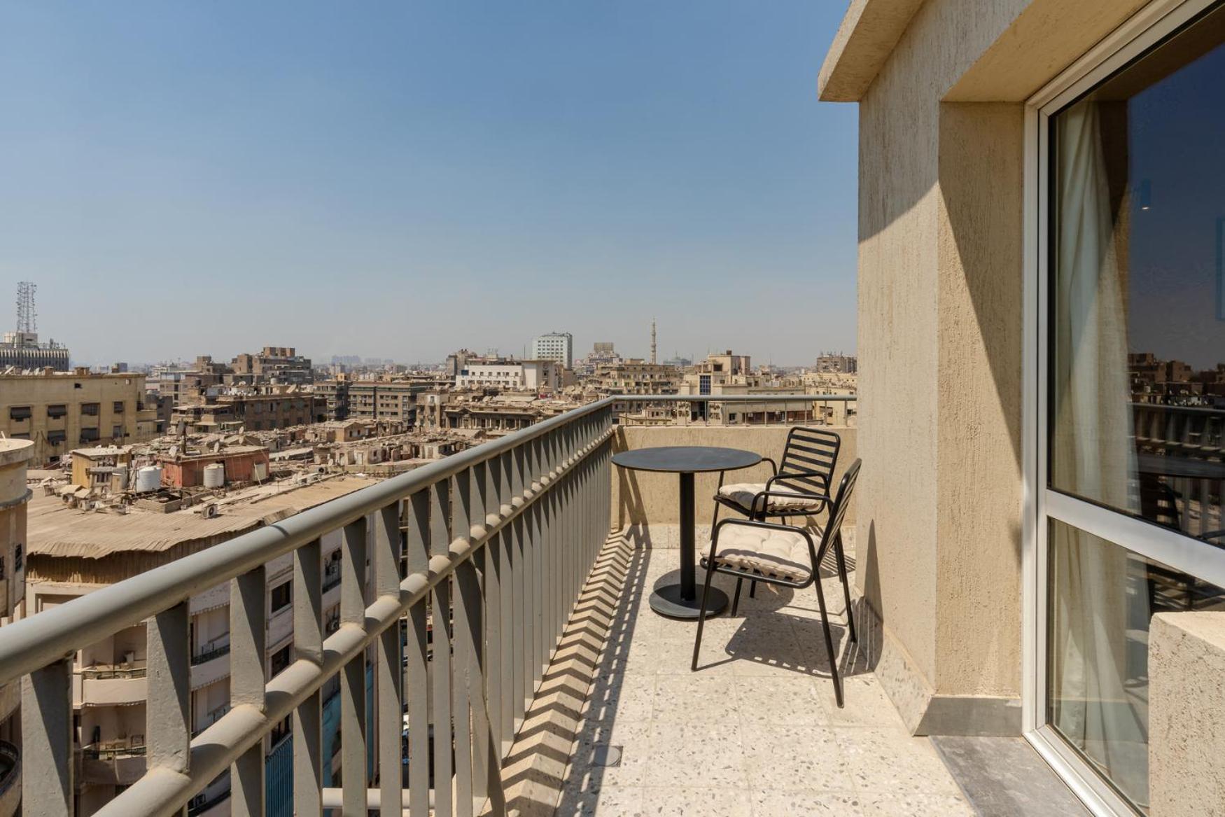 grey l studio apartments Downtown Cairo Ouzonian House
