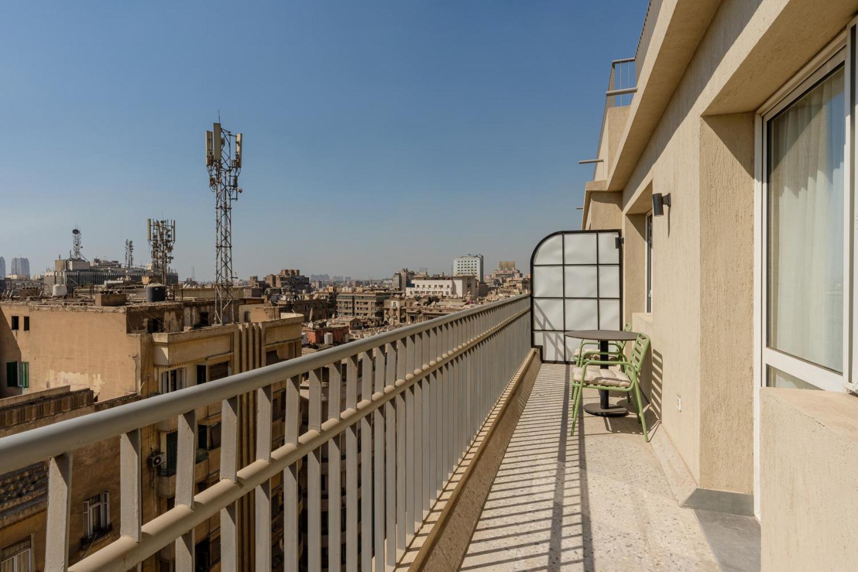 grey l studio apartments Downtown Cairo Ouzonian House