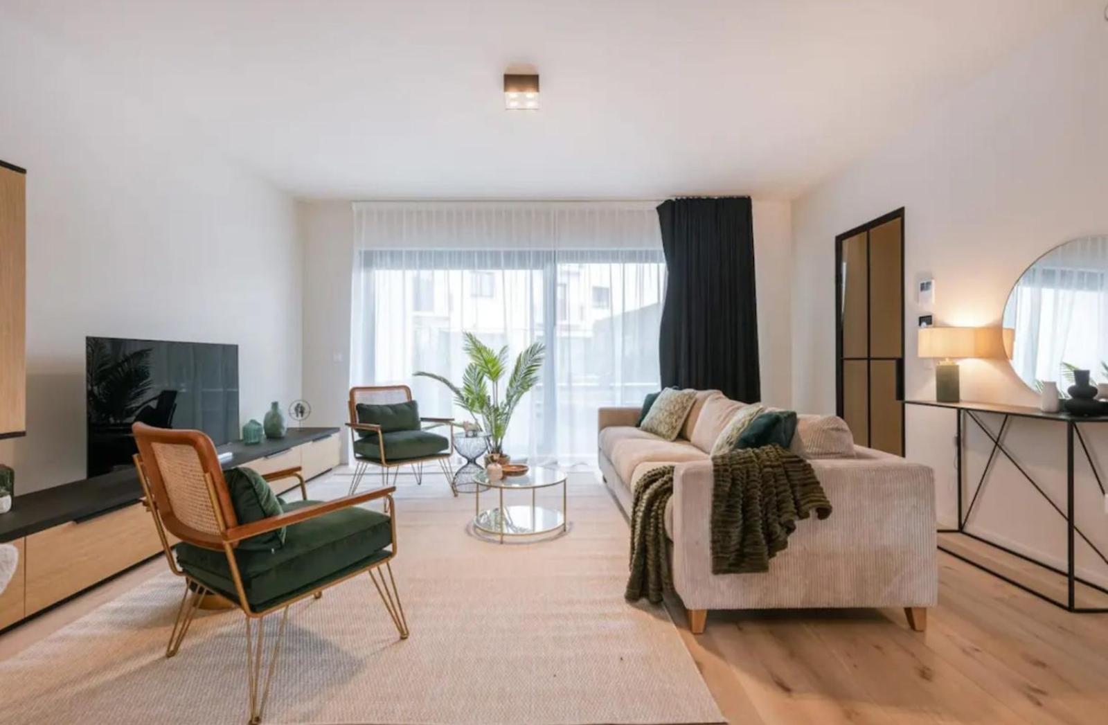 Poseidon Luxe gelijkvloers appartement met tuin ,terras en gratis parkeren ondergrondse staanplaats
