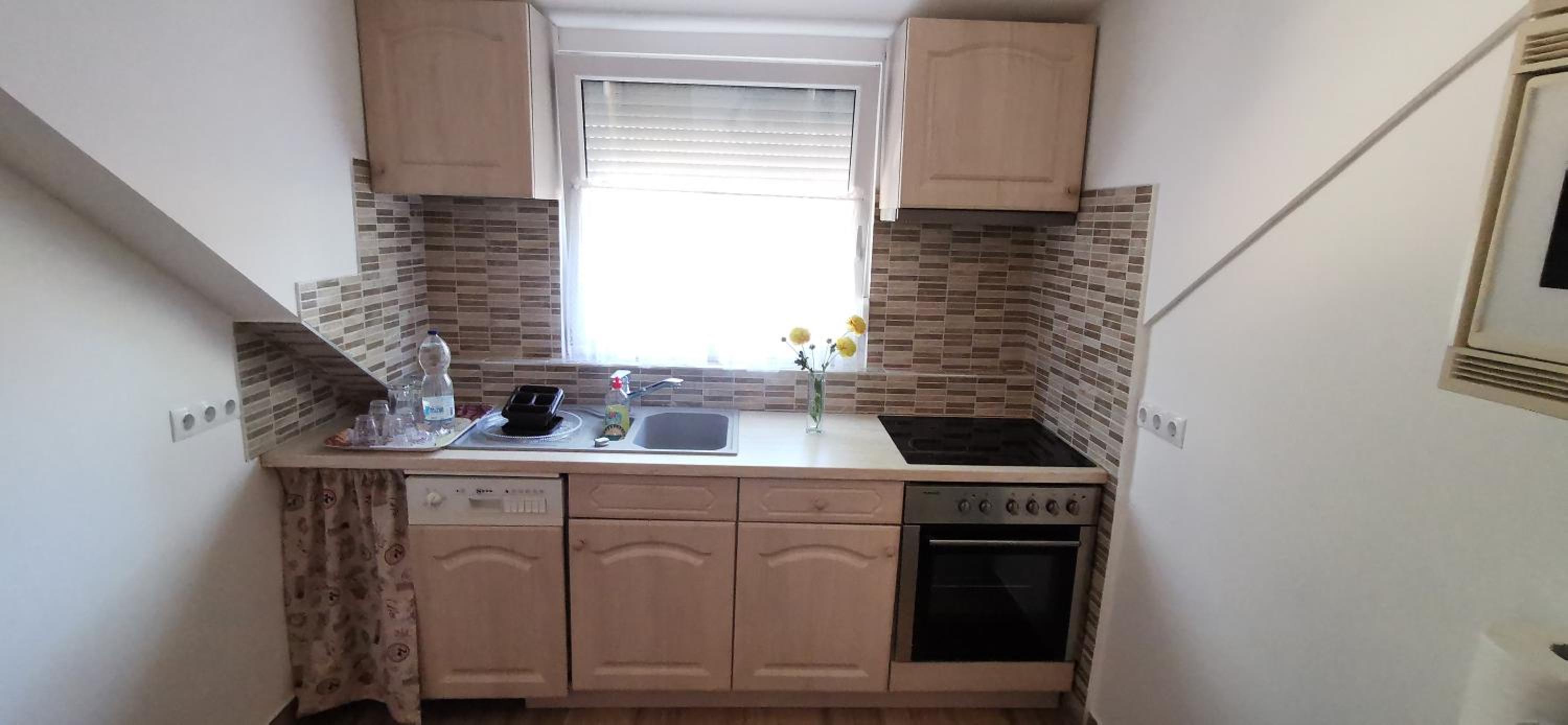 Rigófészek Apartmanház