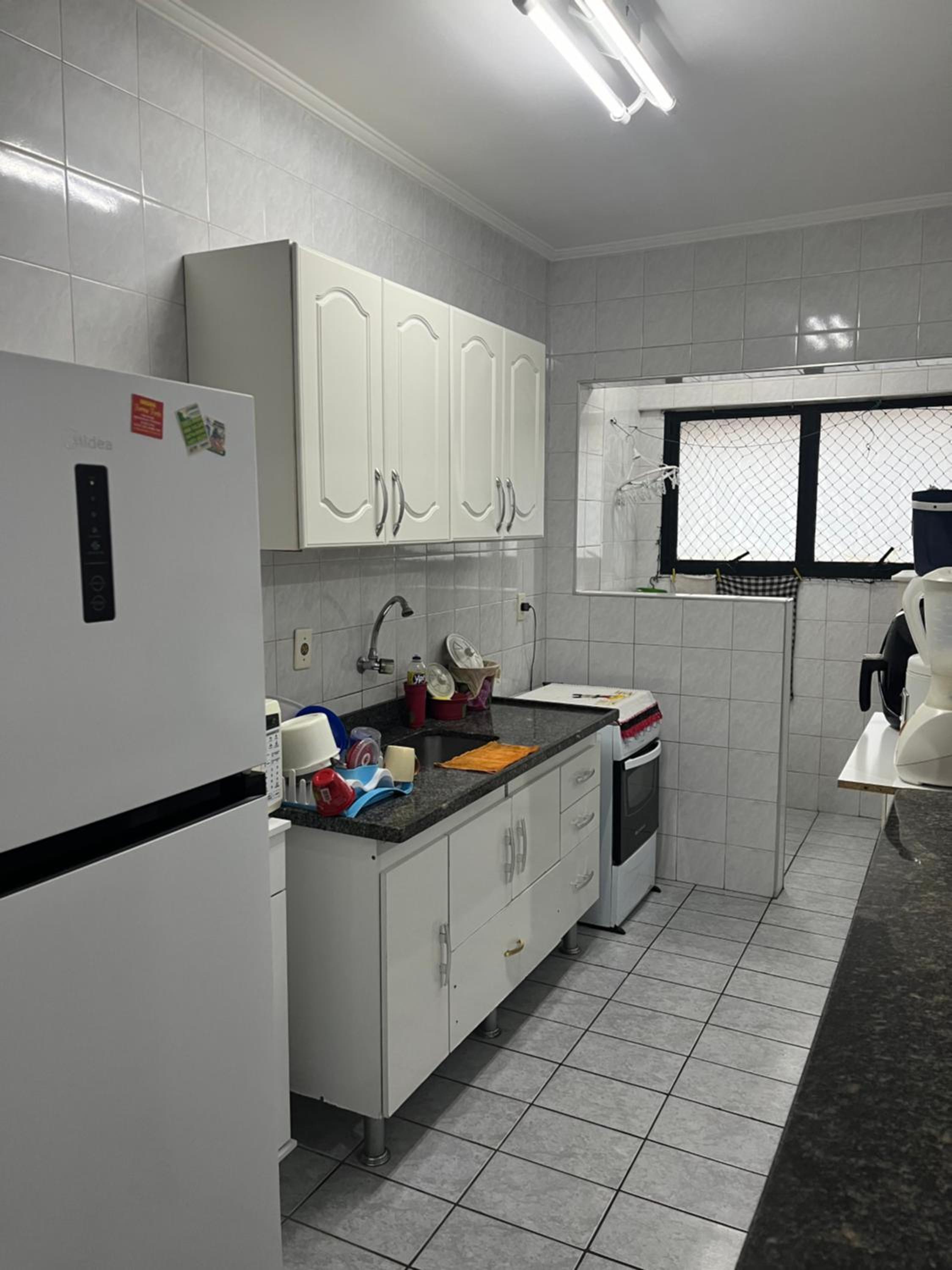 Ap Canto do Forte com Wi-Fi, TV e varanda