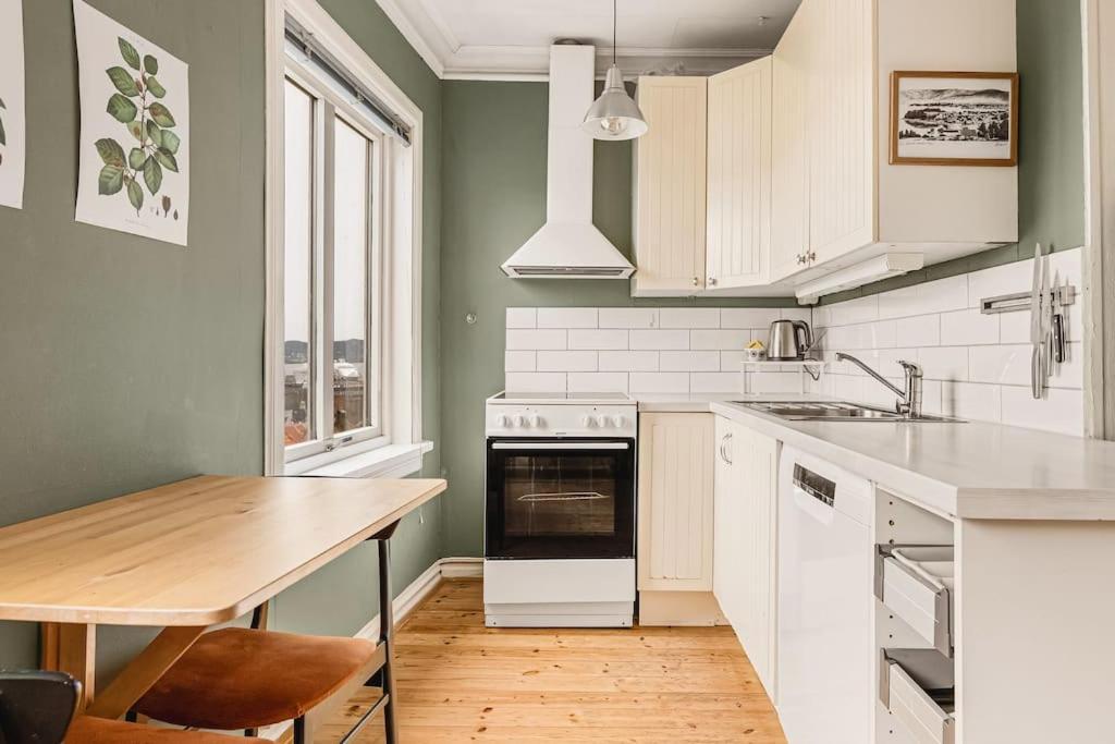 Nydelig hus med privat hage og fantastisk utsikt over Fisketorget, Bryggen og Bergen sentrum