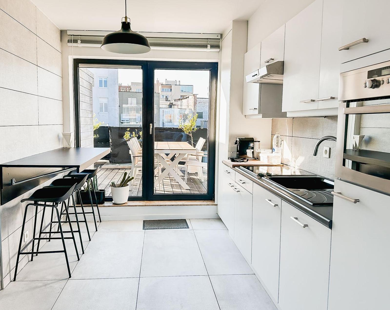 Modern appartement centrum Oostende met enorm dakterras (parking beschikbaar)
