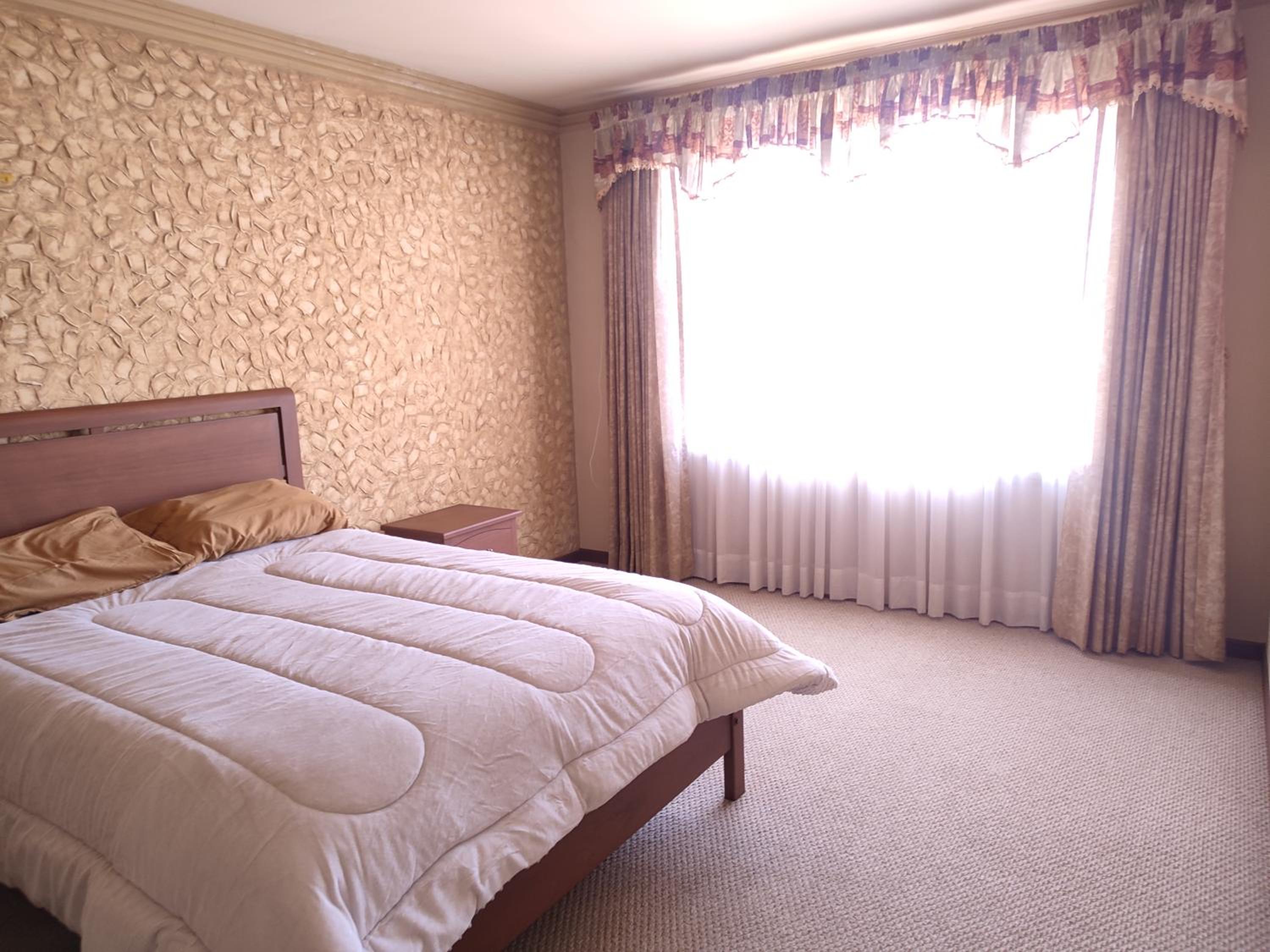 Hogar familiar con patio