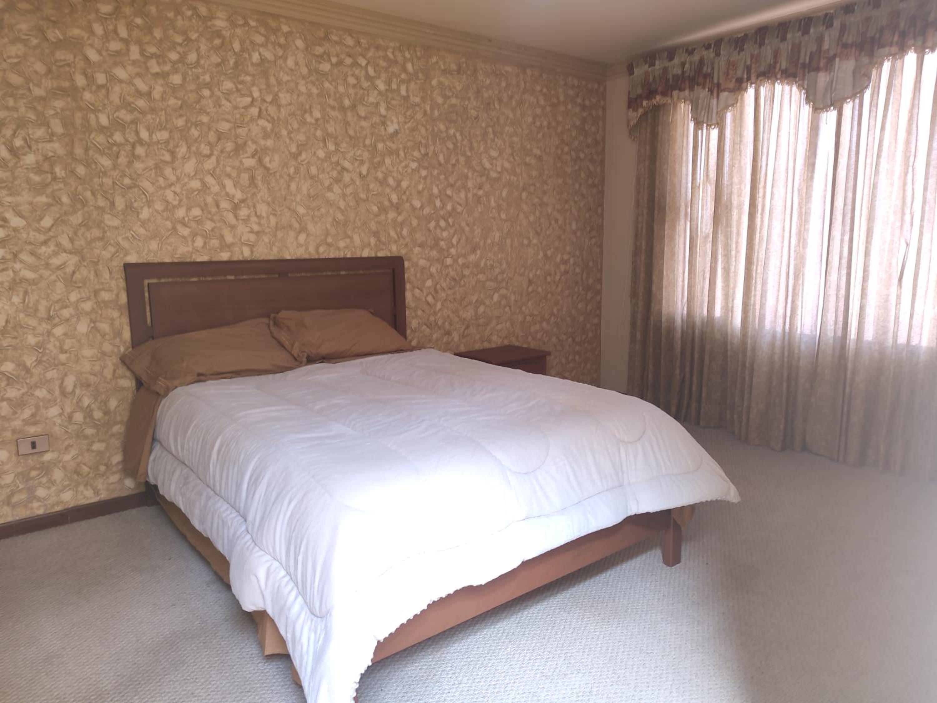 Hogar familiar con patio