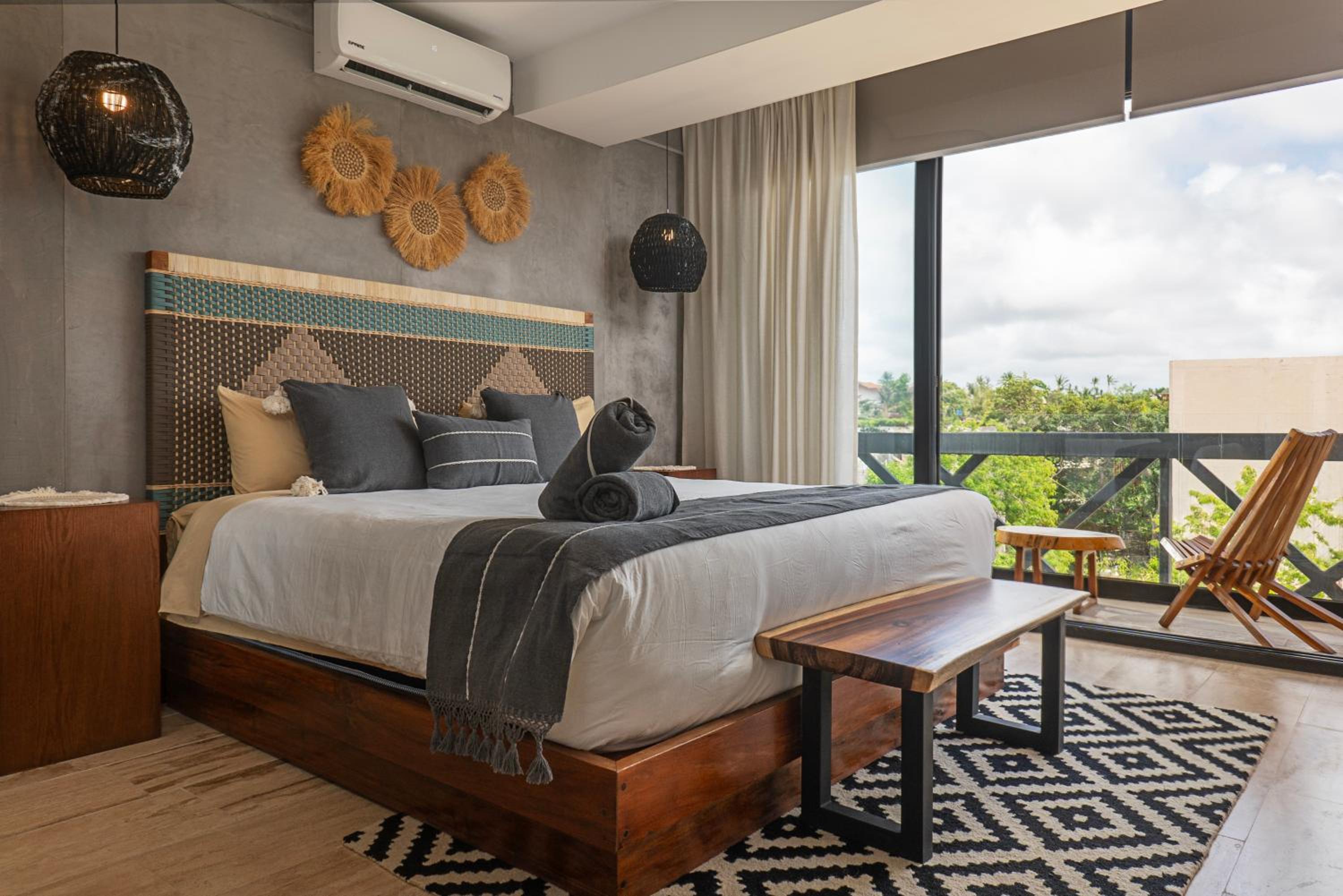 Unwind | Private Balcony & Rooftop Pools | Casago view 4