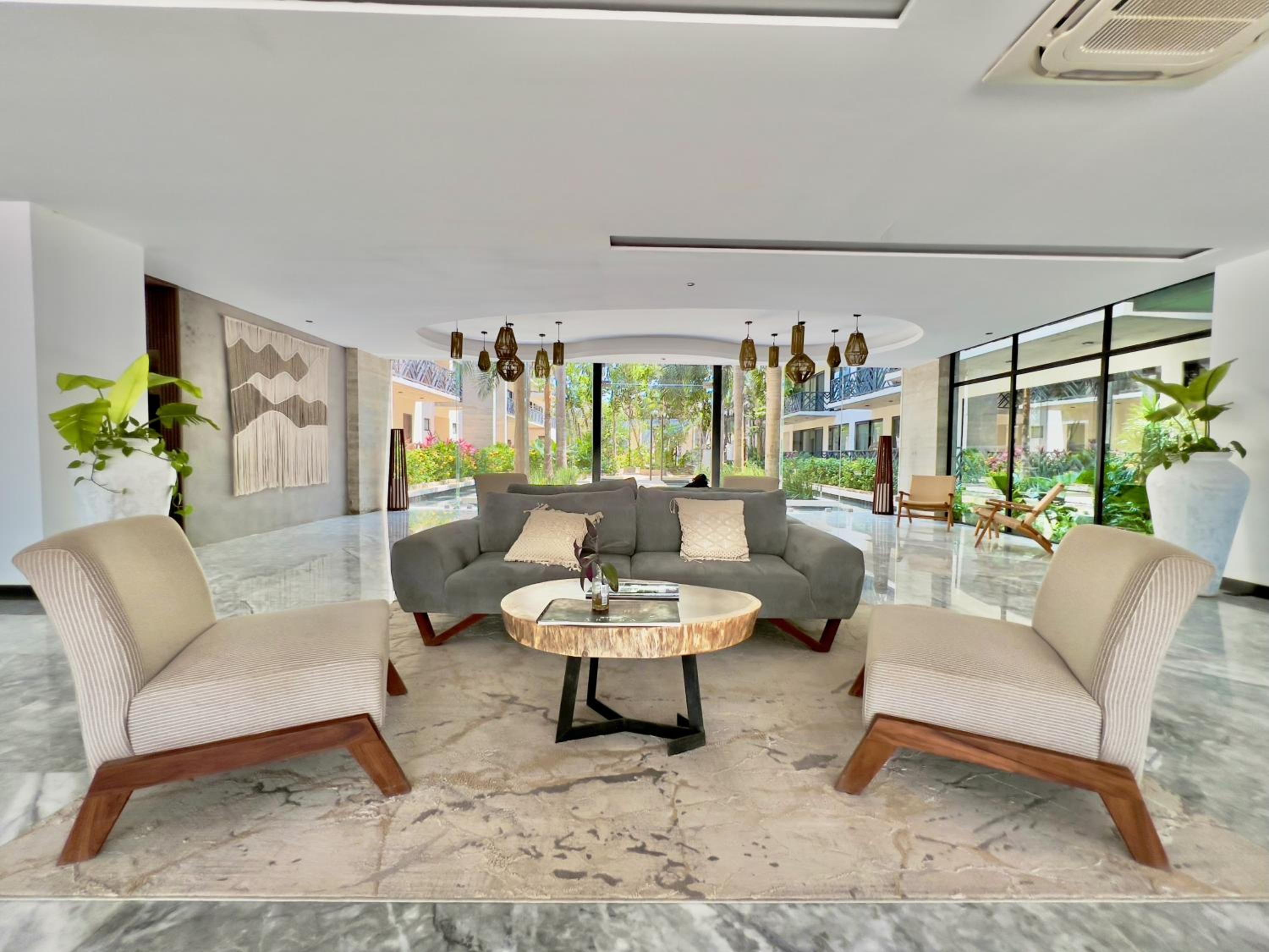 Unwind | Private Balcony & Rooftop Pools | Casago view 5