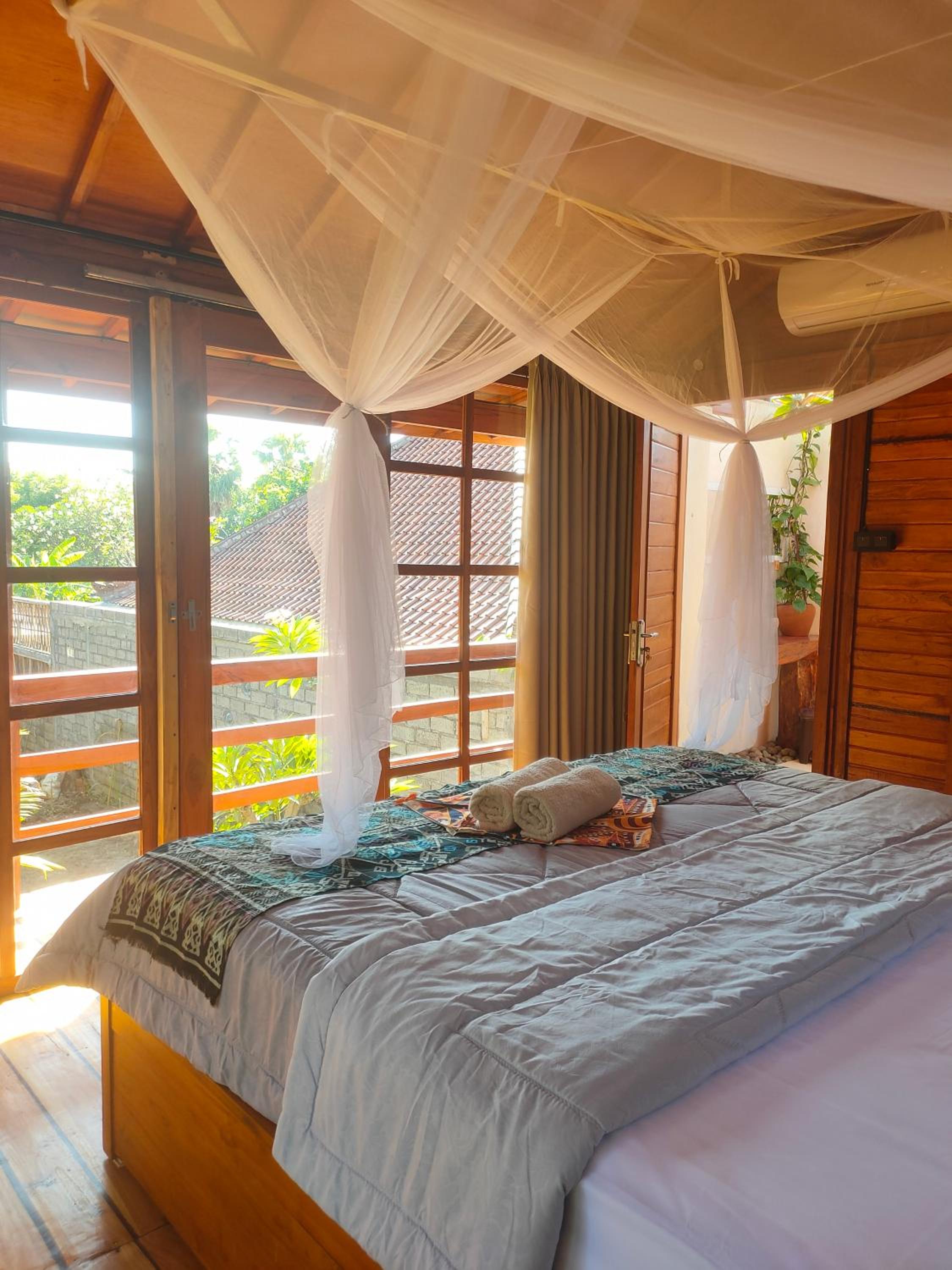VANAYA wooden Lodges in Lush Garden view 5