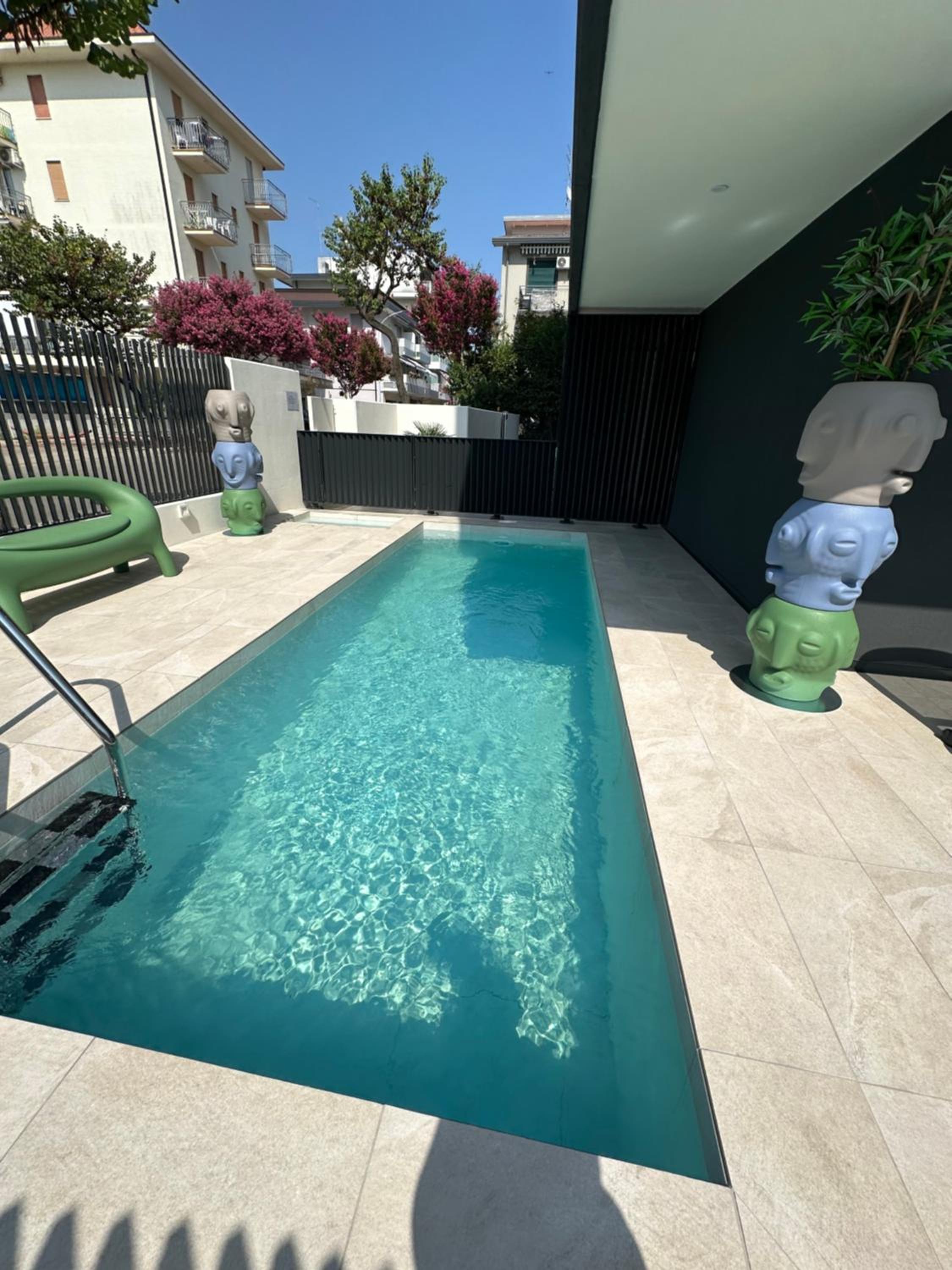 Beach Palace with small swimming pool, private beach, parking