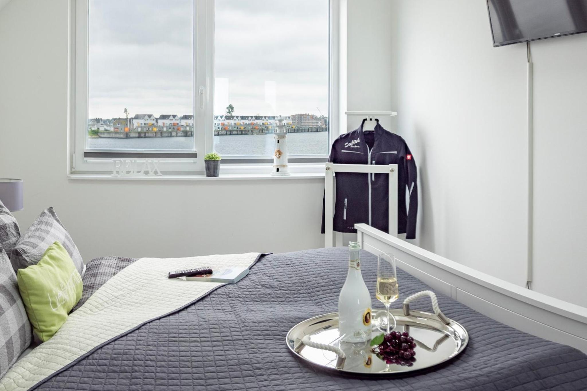 Maisonette Fewo Ostseeflair by Seeblick Ferien ORO, erste Wasserreihe, E-Säule