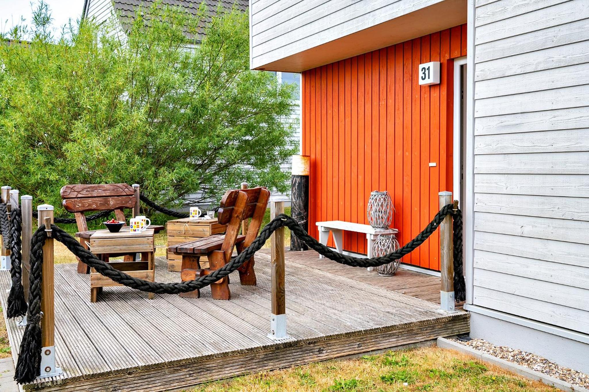 Ferienhaus Boje by Seeblick Ferien ORO, erste Wasserreihe, Kamin, 7Pers