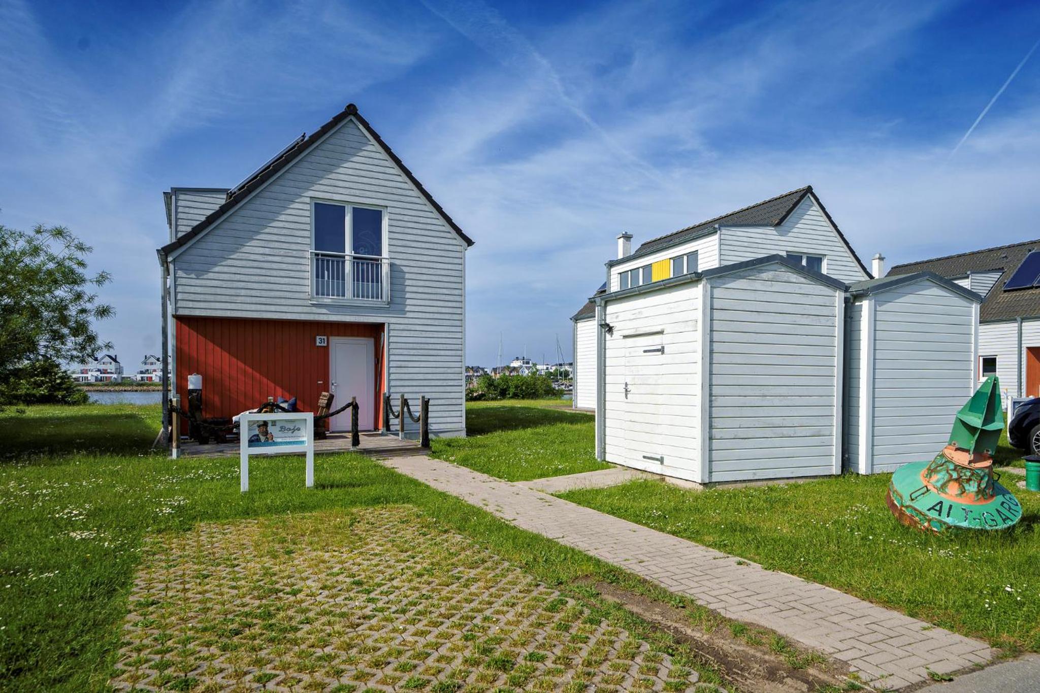 Ferienhaus Boje by Seeblick Ferien ORO, erste Wasserreihe, Kamin, 7Pers