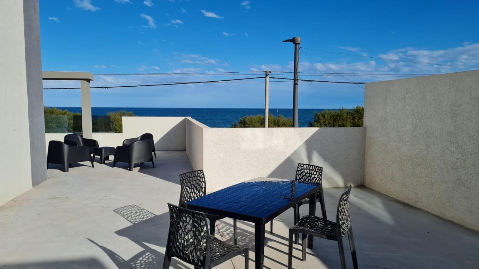 Departamento Las Olas con terraza frente al mar