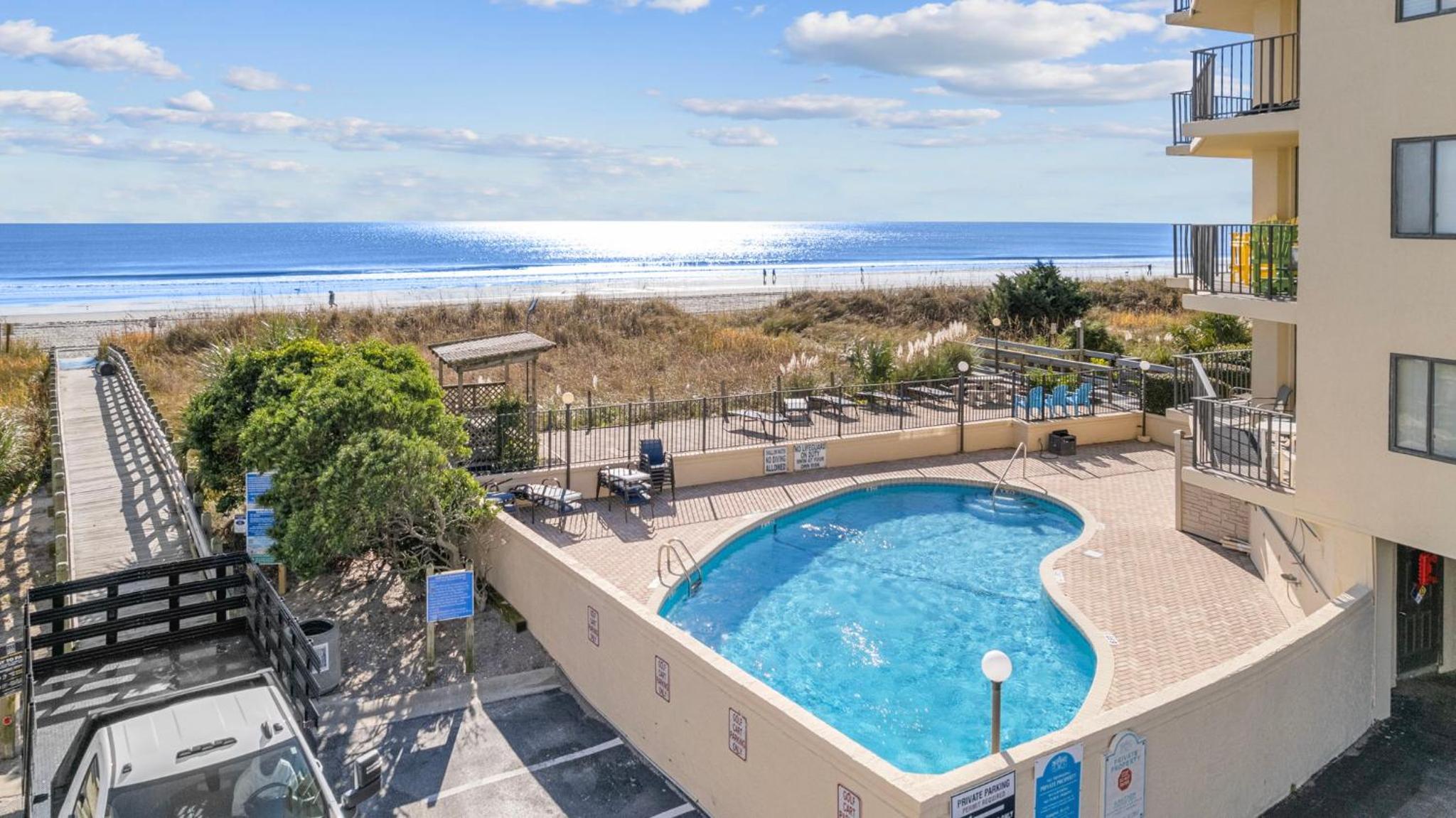 Expansive Oceanfront Balcony at The Summit with Pool by myBeach Vacation Rentals view 3