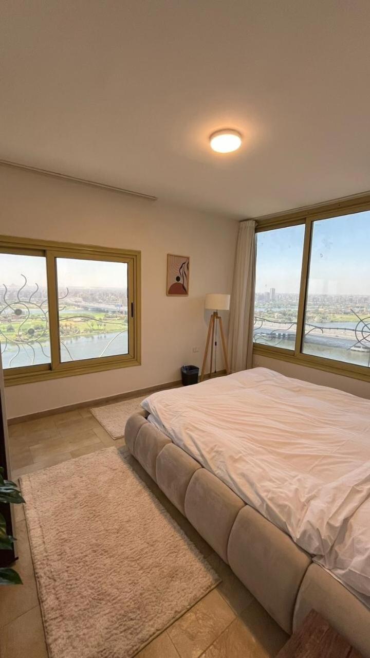 Nile and pyramids view 4BR apt