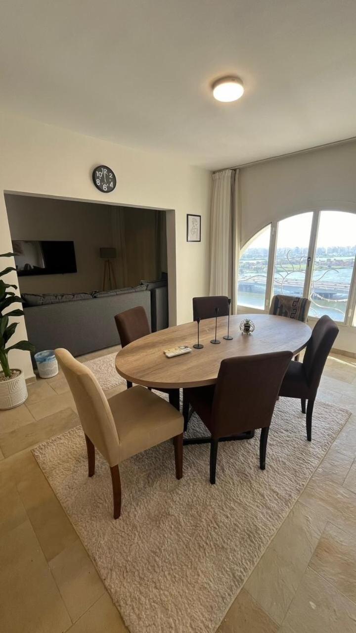 Nile and pyramids view 4BR apt
