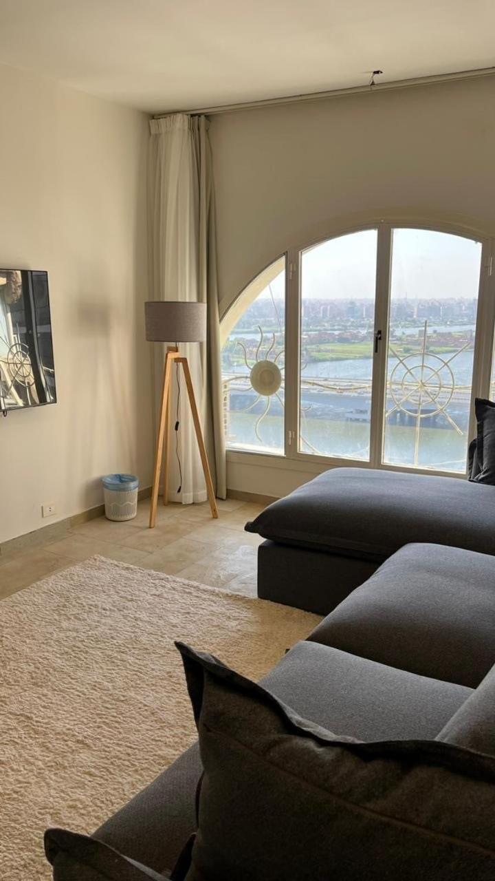 Nile and pyramids view 4BR apt
