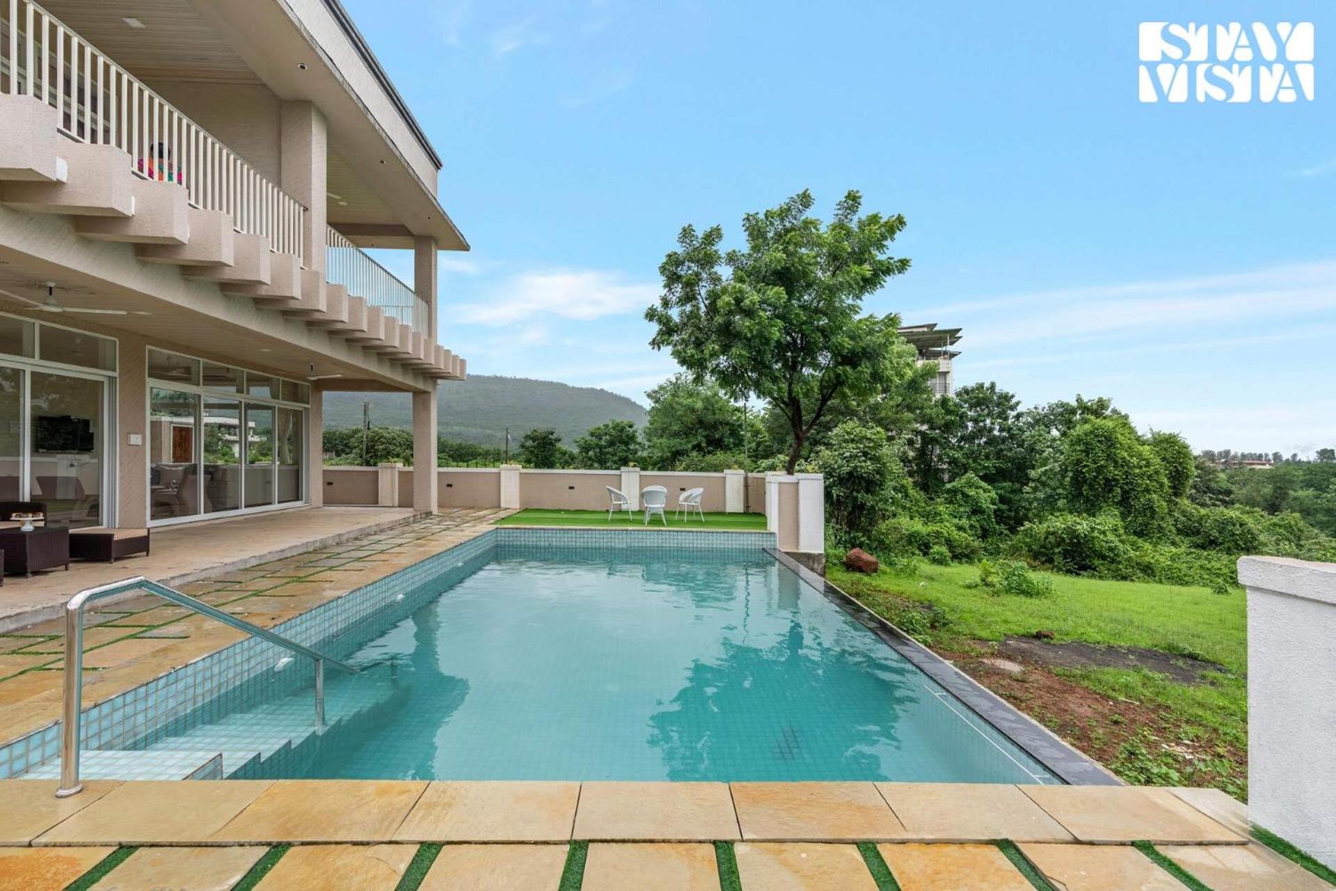 StayVista at Sunbeam Villa - Pool, WiFi & Mountain View view 2