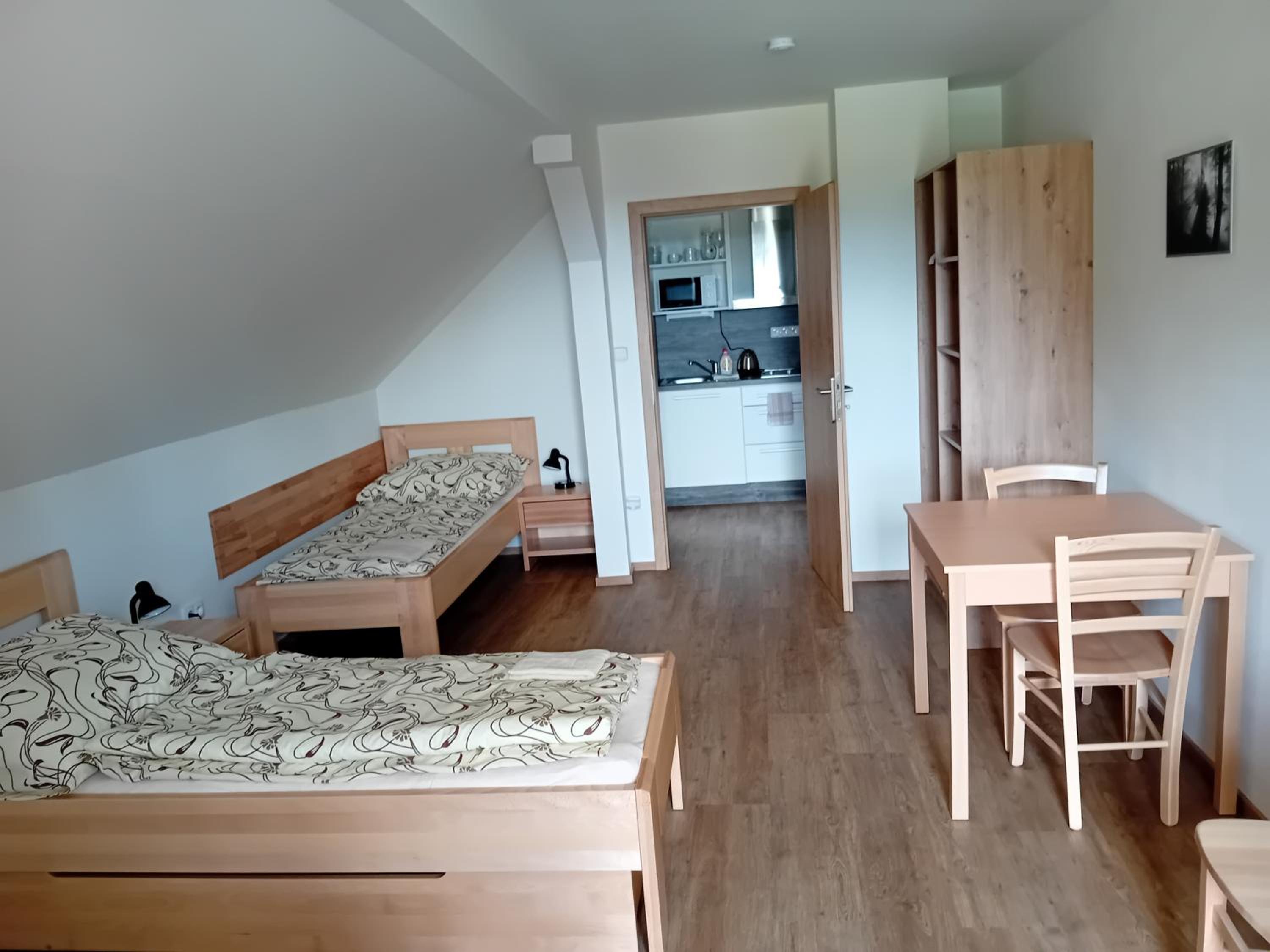 Apartmány u lesa