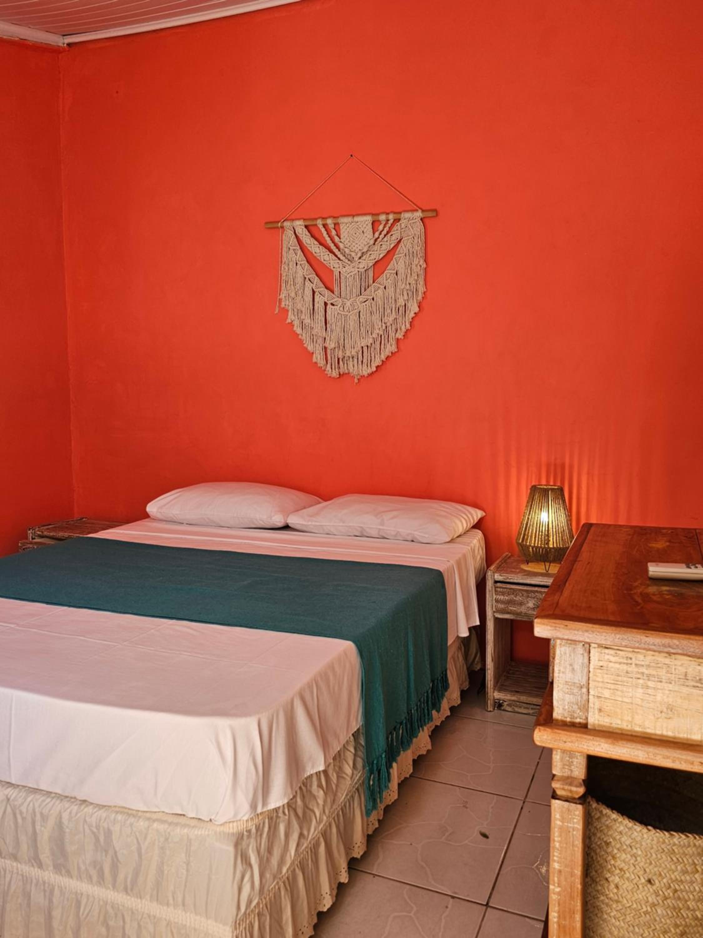 Casa Mukau pé na areia